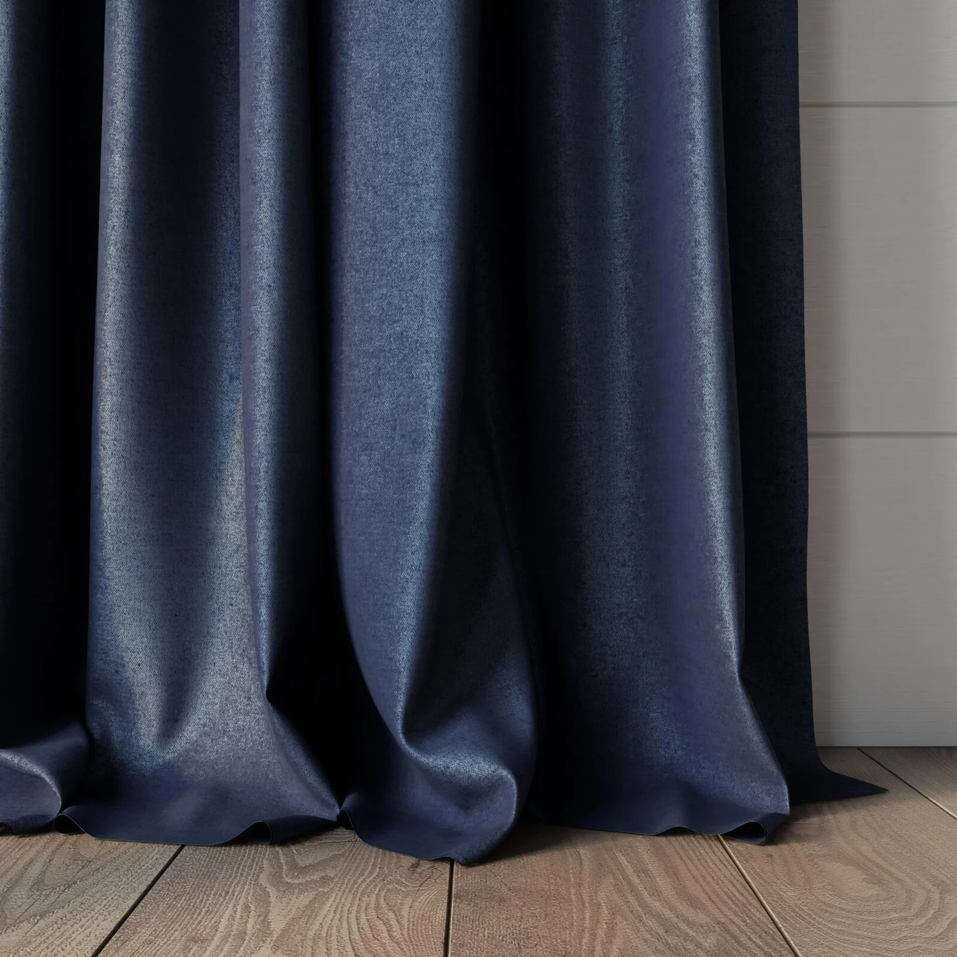 Bottom view of Drama Denim, puddled, on curtain rod