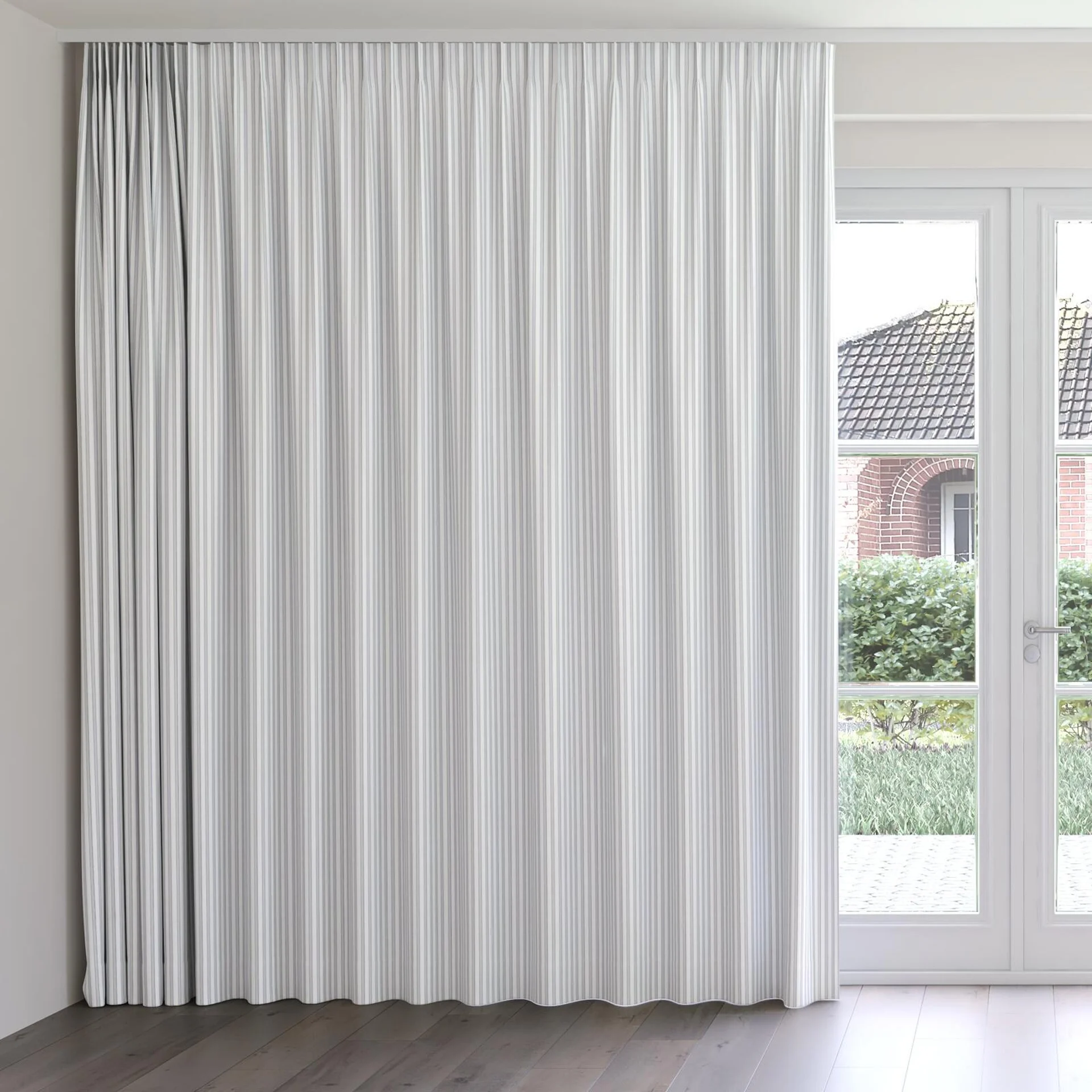 Front view of Chambray Ticking Sky Blue, on curtain rail