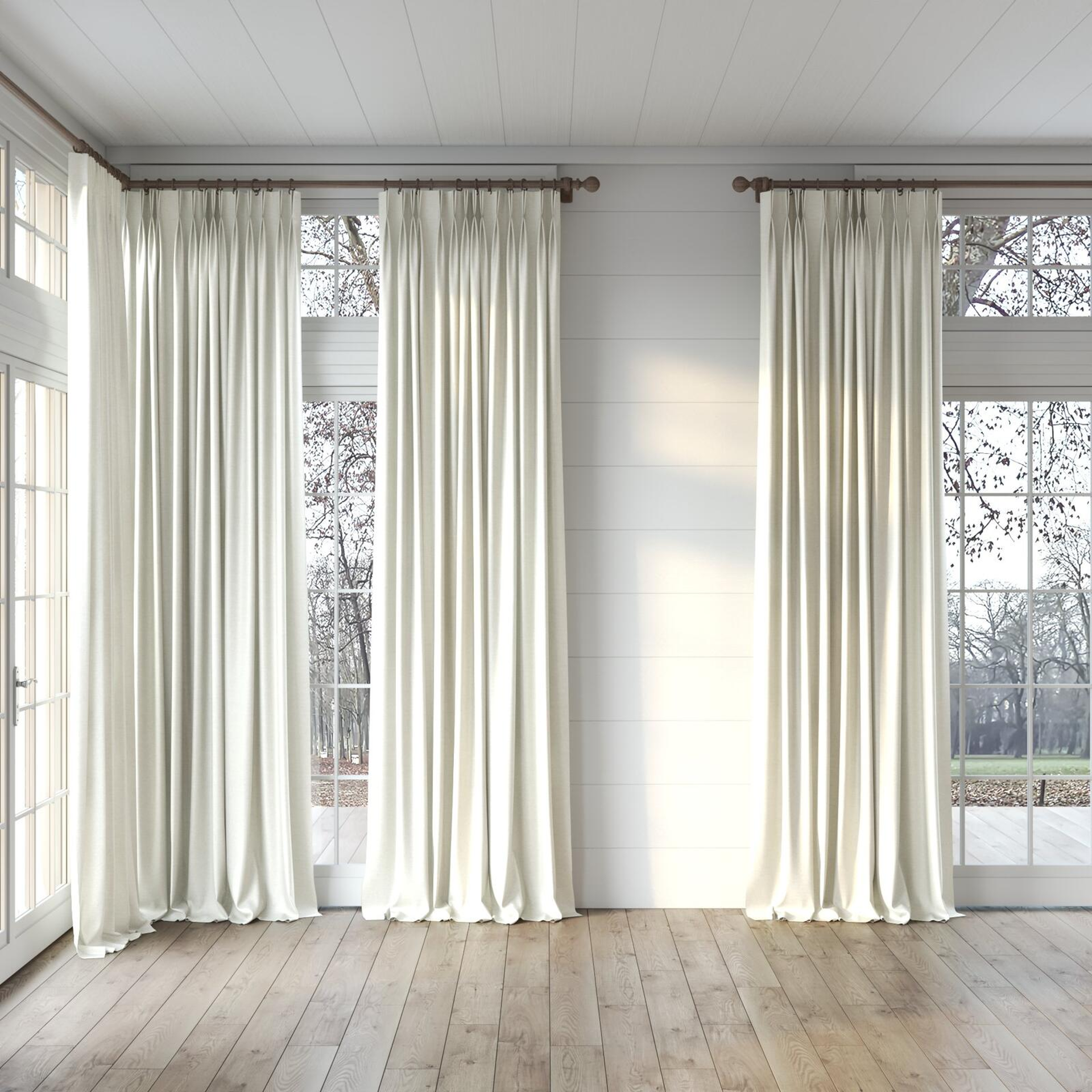 Full view of Provence Ivory, puddled, on curtain rod