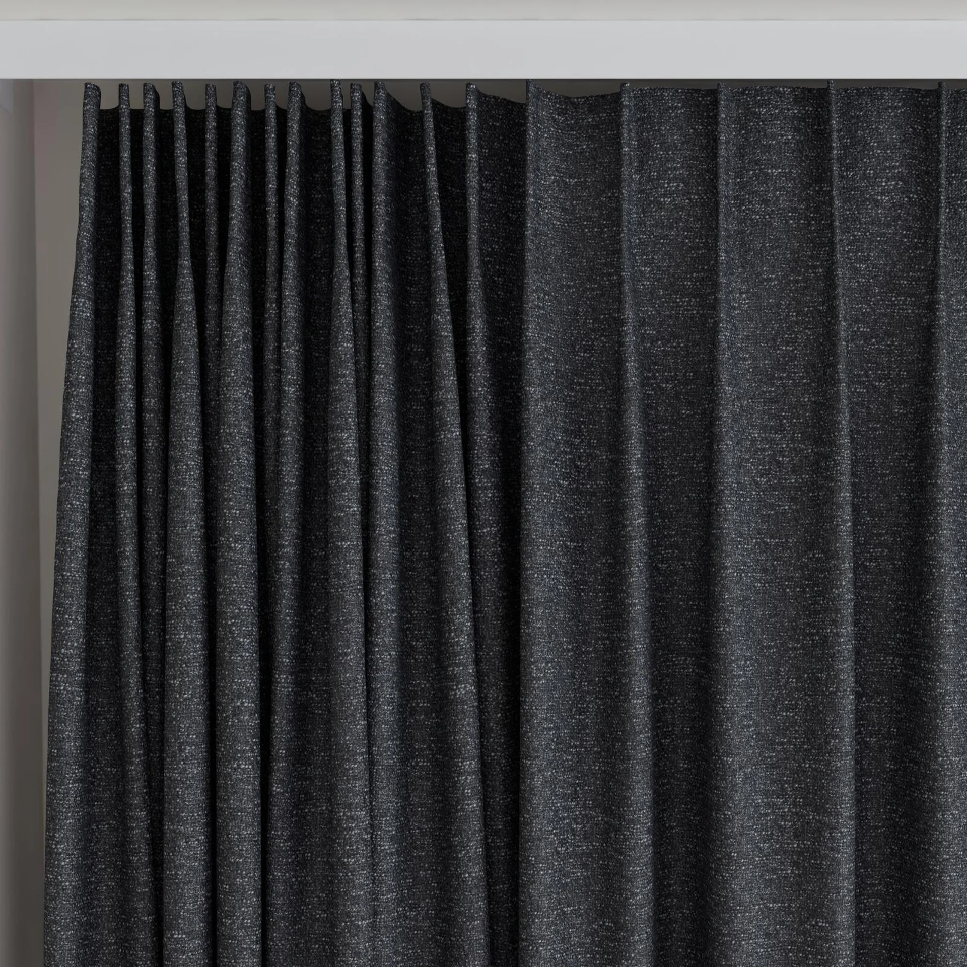 Top view of Bora Bora Soot, on curtain rail