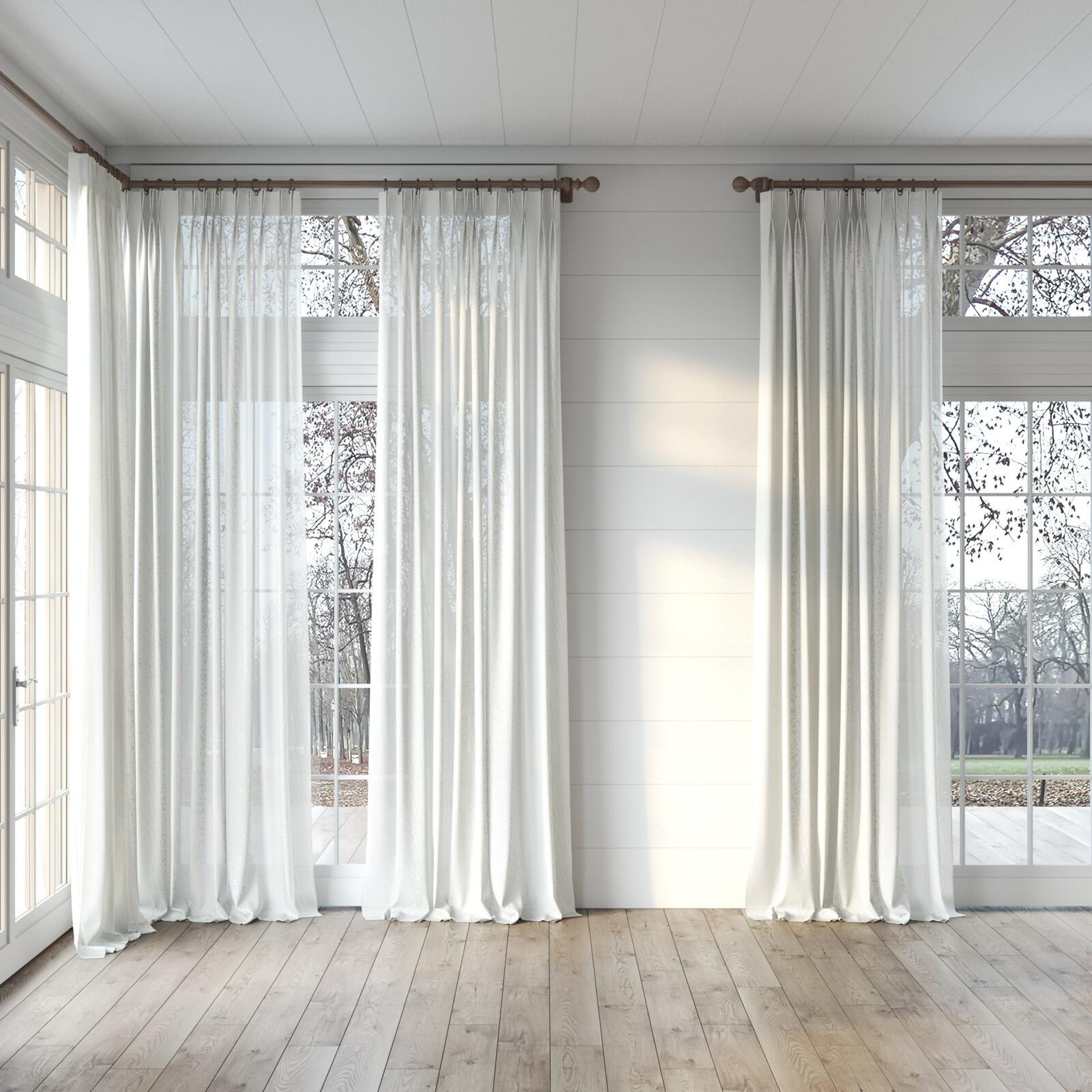 Full view of Rava Ivory, puddled, on curtain rod