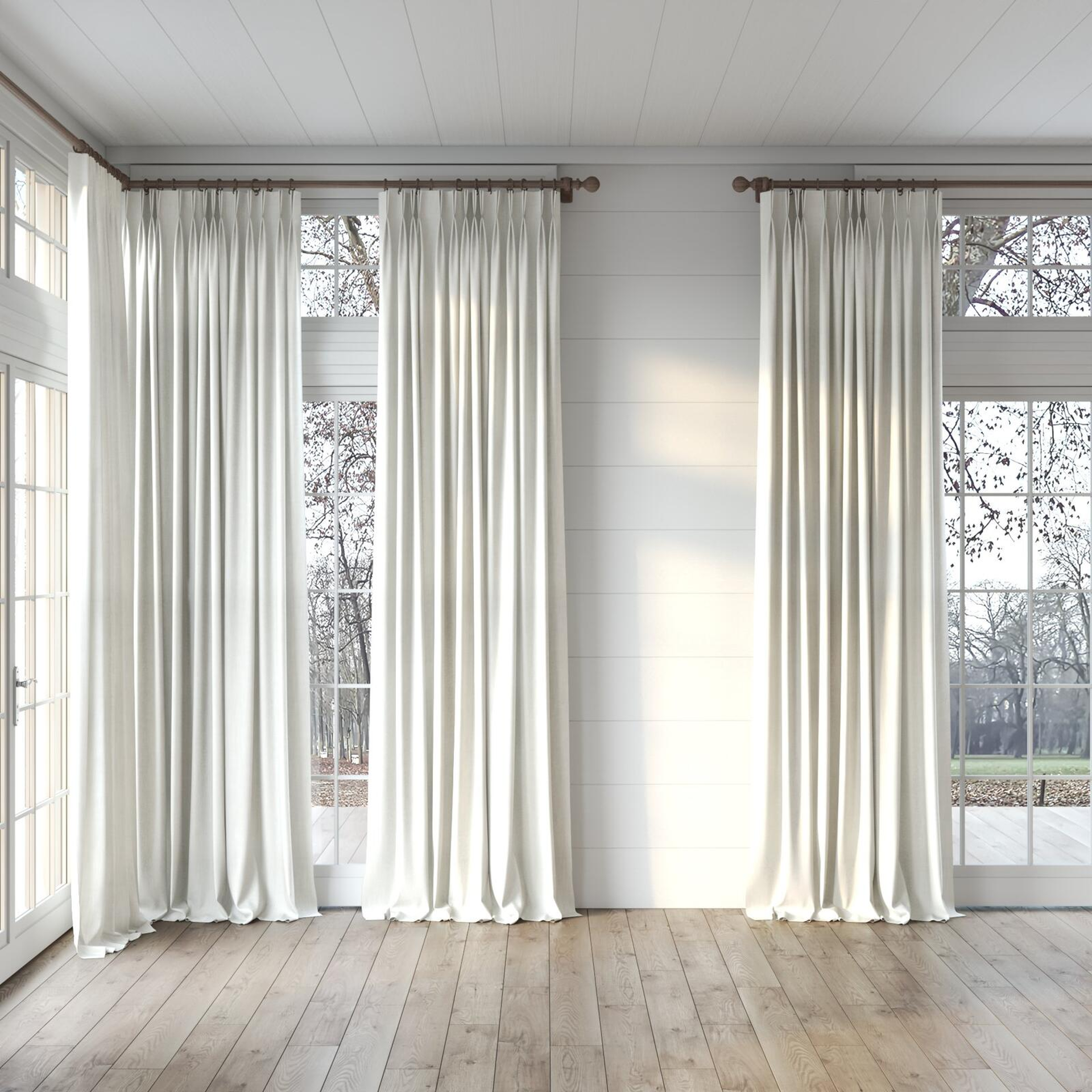 Full view of Lexicon Ecru, puddled, on curtain rod