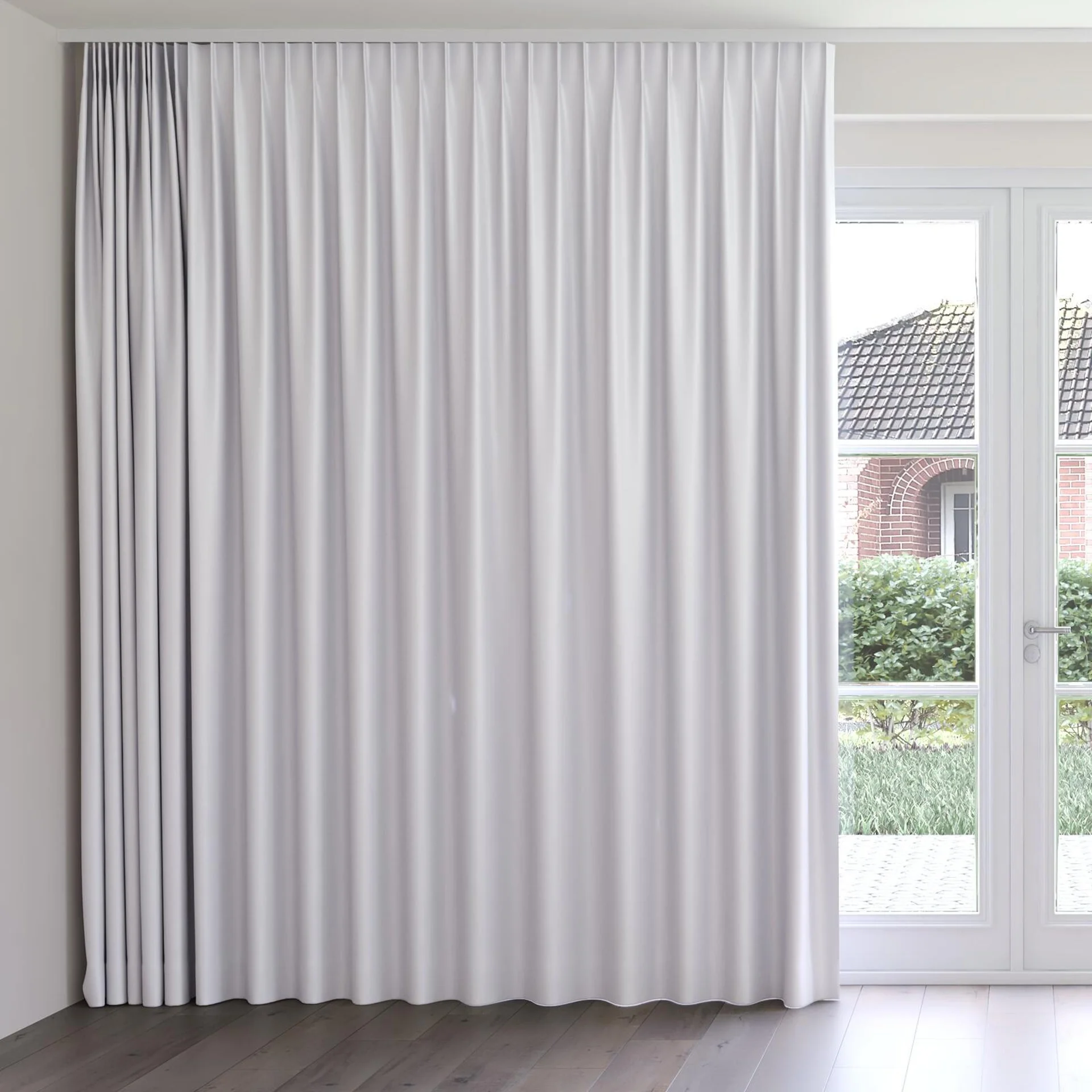 Front view of Stellar Blackout Silver, on curtain rail