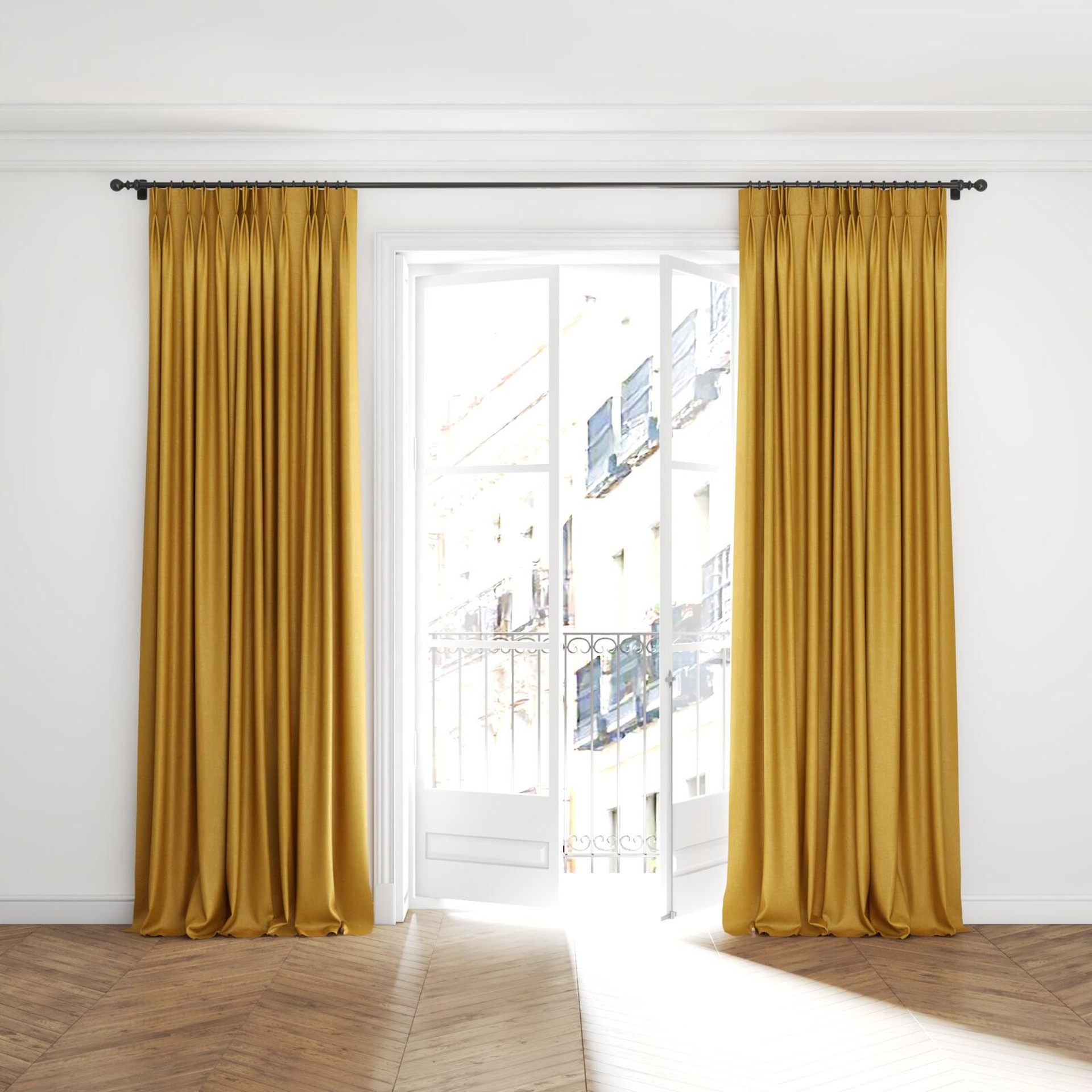 Full view of Bronco Honey, puddled with pinch pleat, on curtain rod
