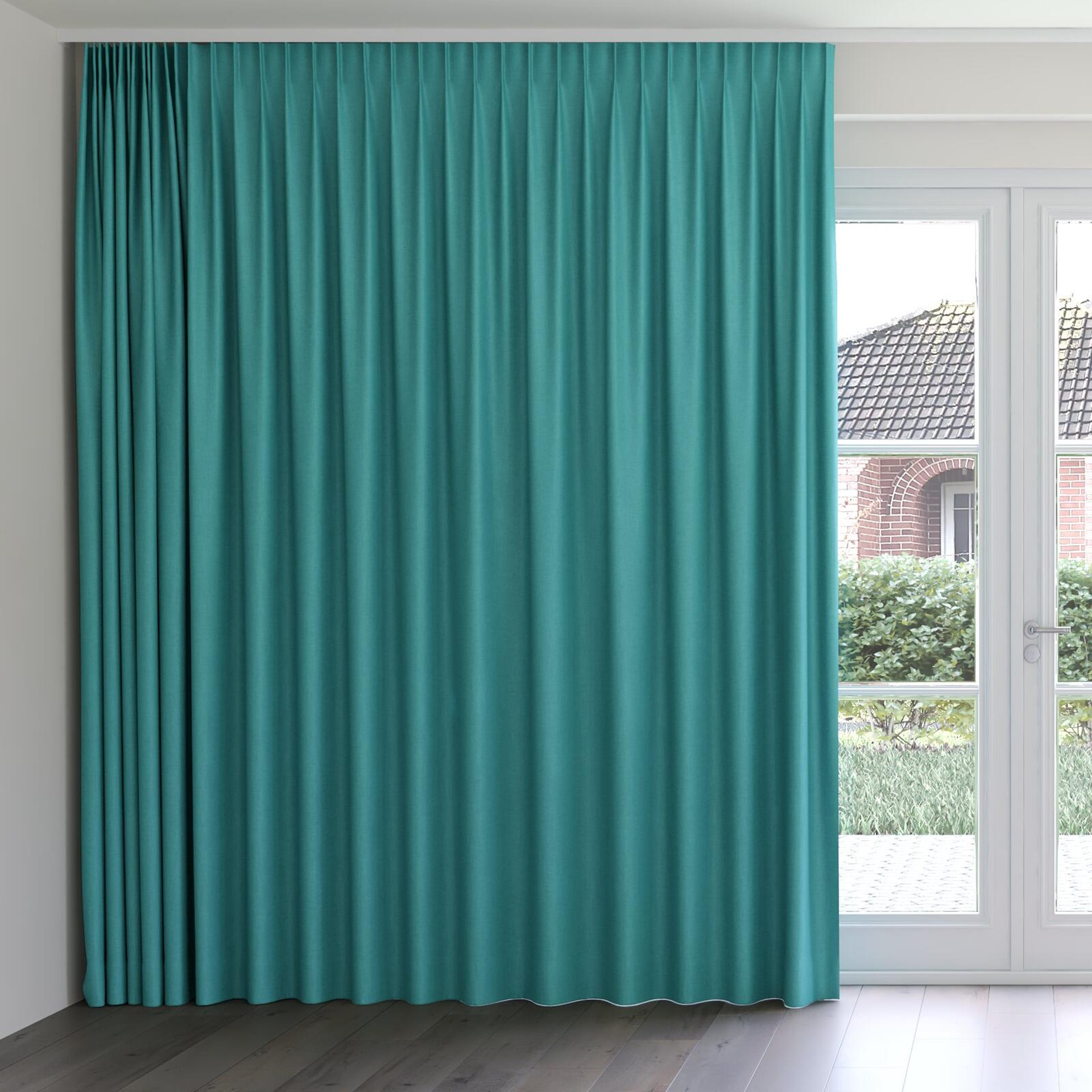 Front view of Cushy Teal, on curtain rail