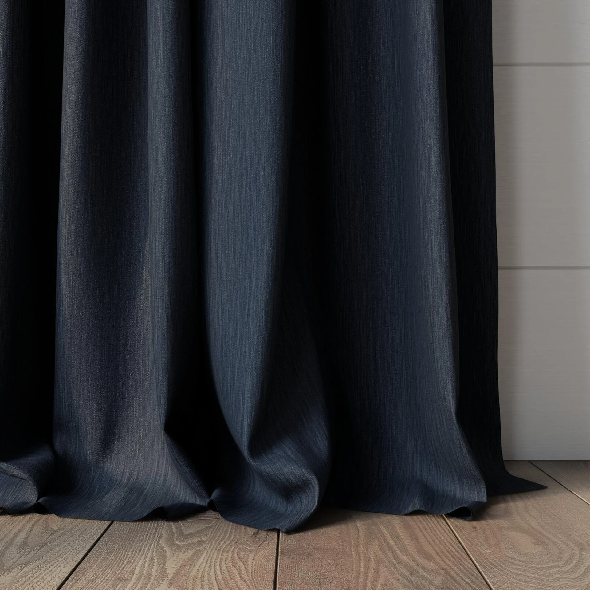 Bottom view of Tuxedo Jeans, puddled, on curtain rod