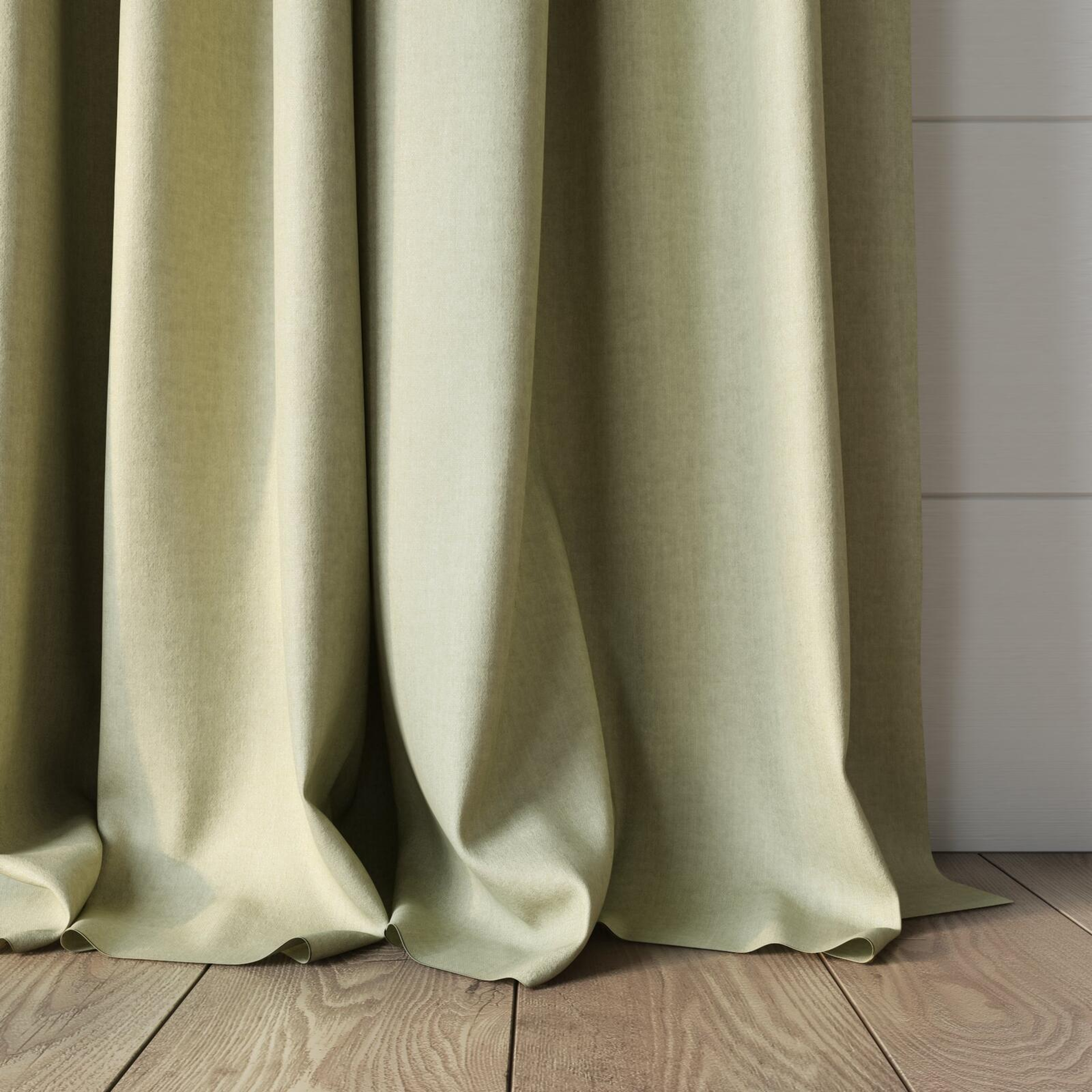 Bottom view of Cushy Dune, puddled, on curtain rod