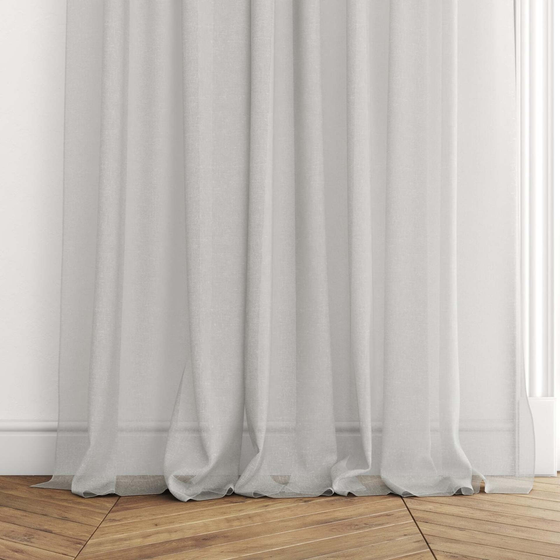 Bottom view of Tempest Willow, puddled with pinch pleat, on curtain rod