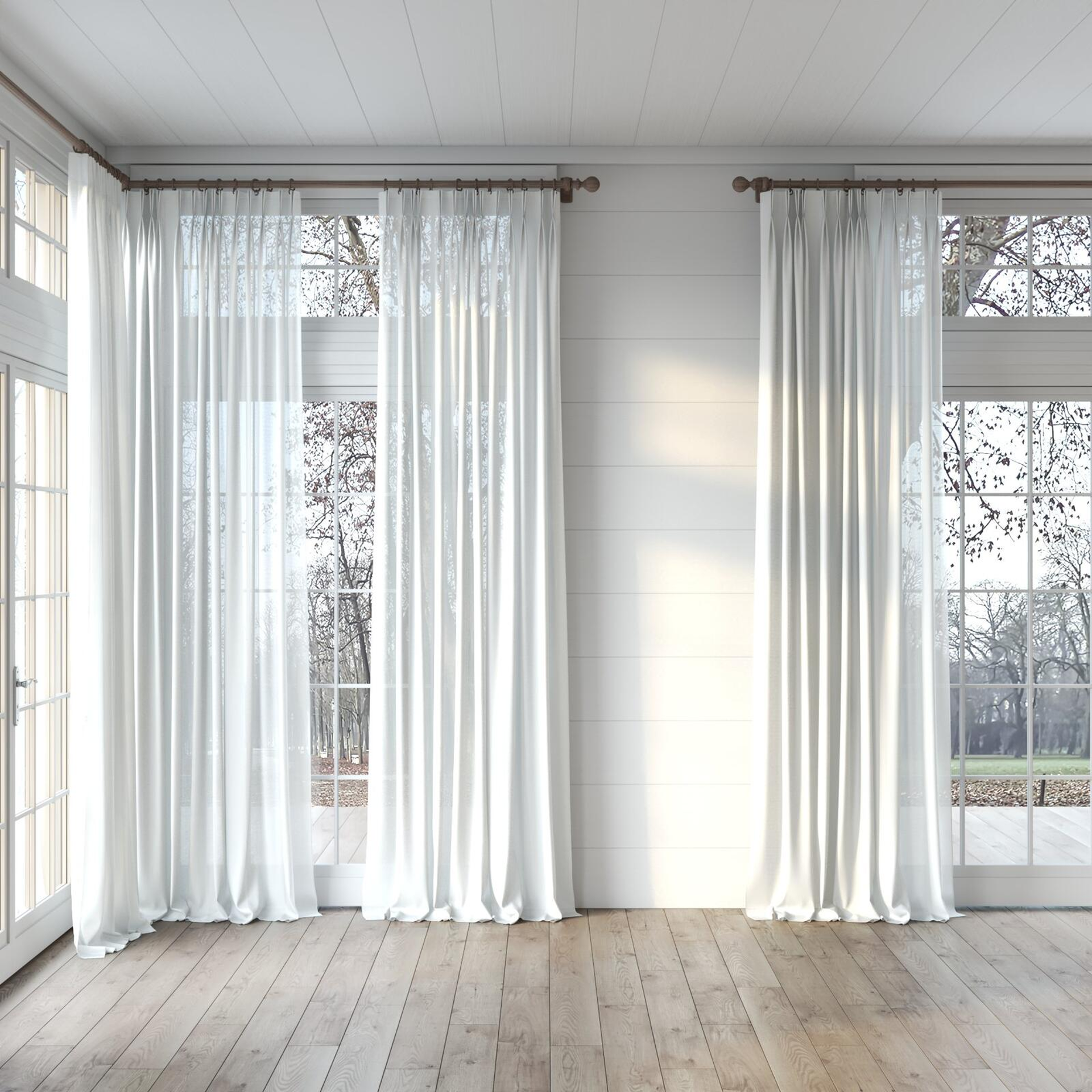 Full view of Sunlight Linen, puddled, on curtain rod