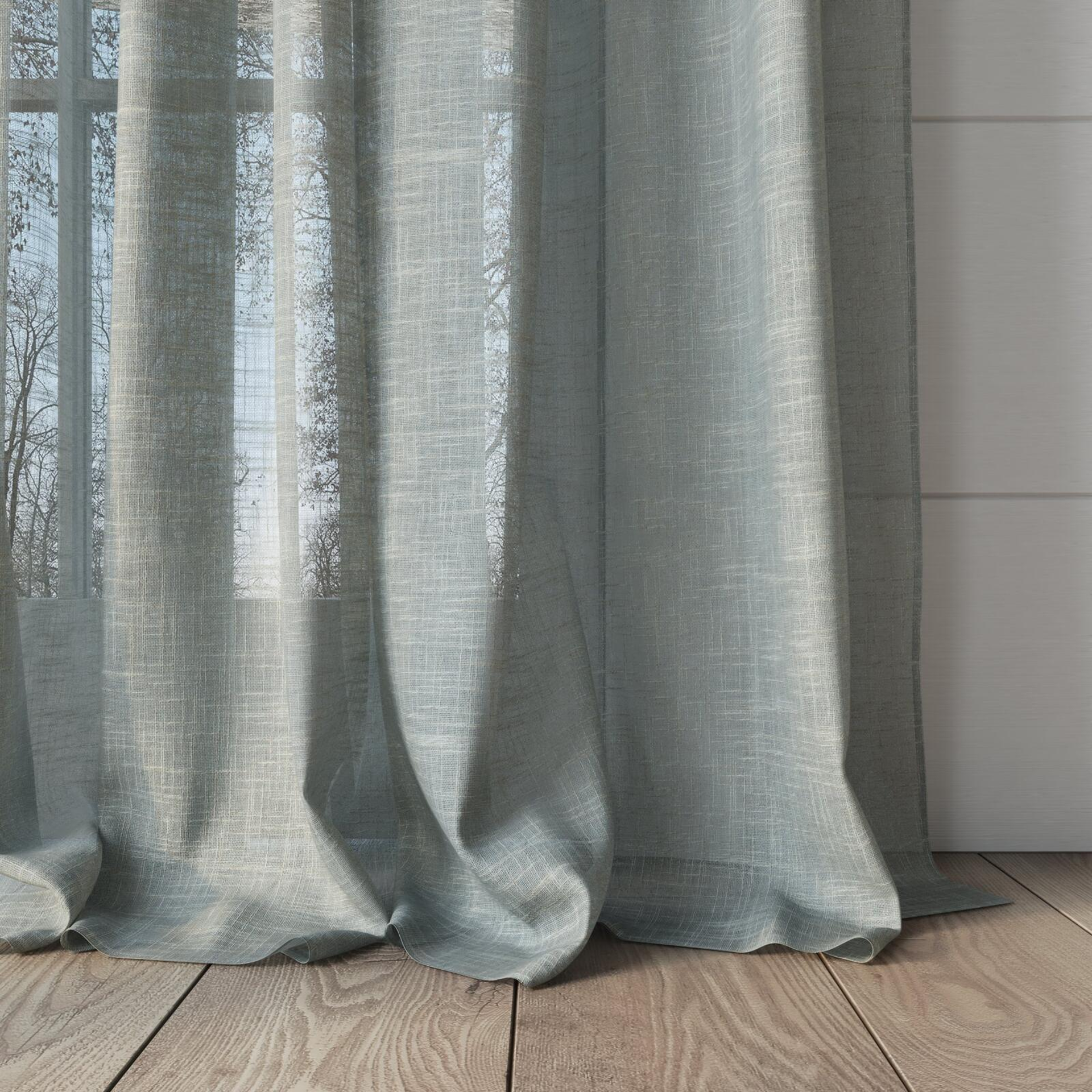 Bottom view of Savina Celadon, puddled, on curtain rod
