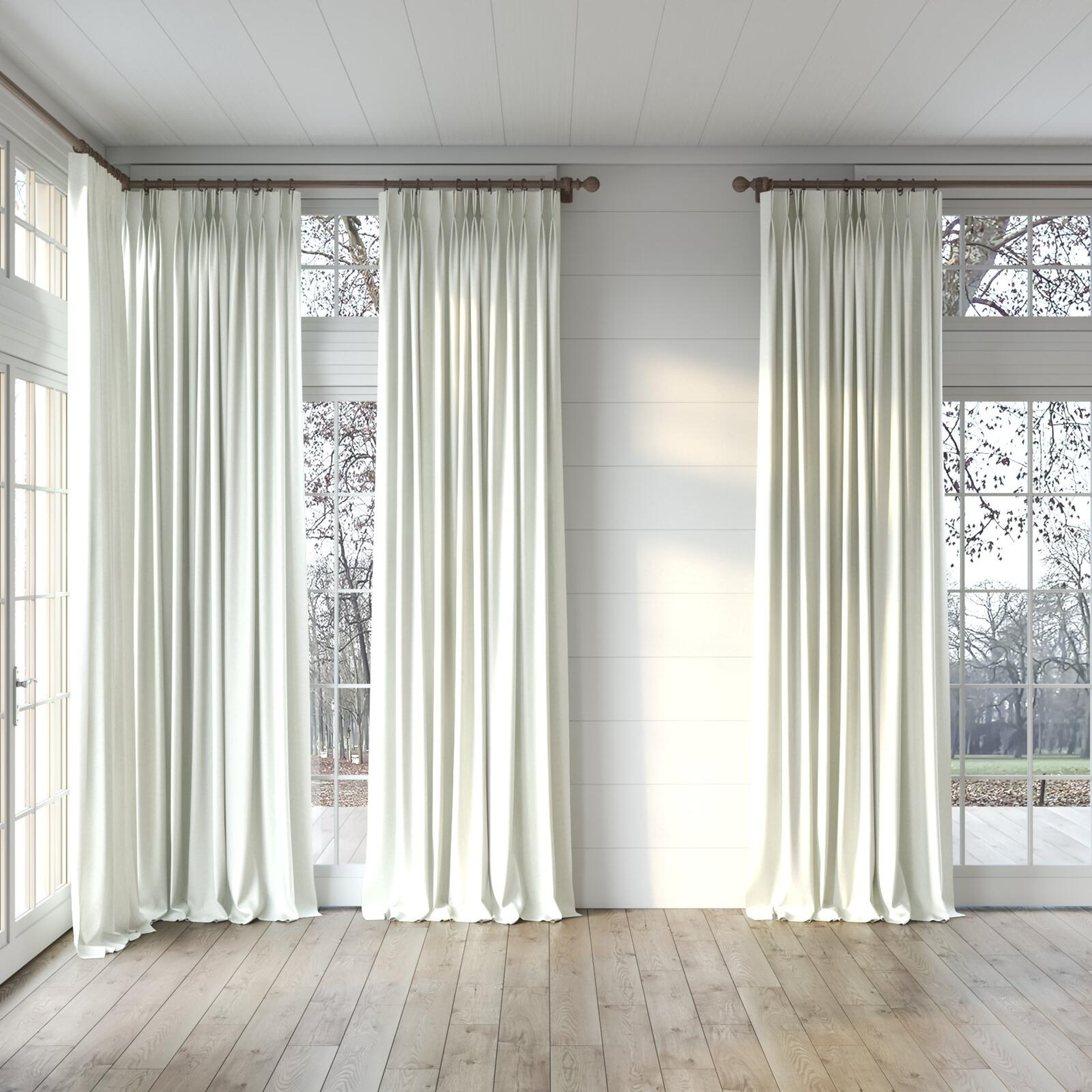 Full view of Woolly/Woolen Cream, puddled, on curtain rod