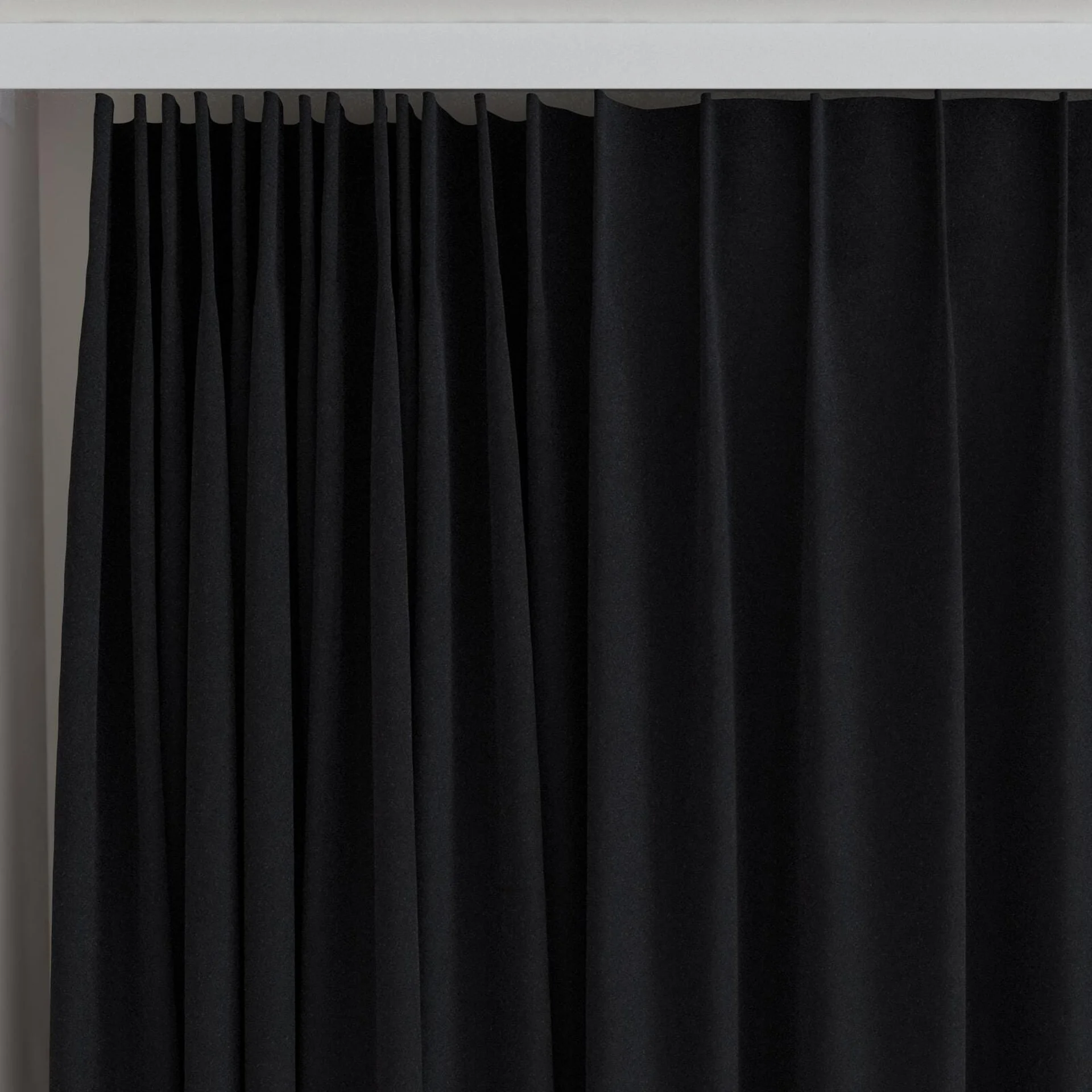 Top view of Lux Velvet Ebony 8702, on curtain rail