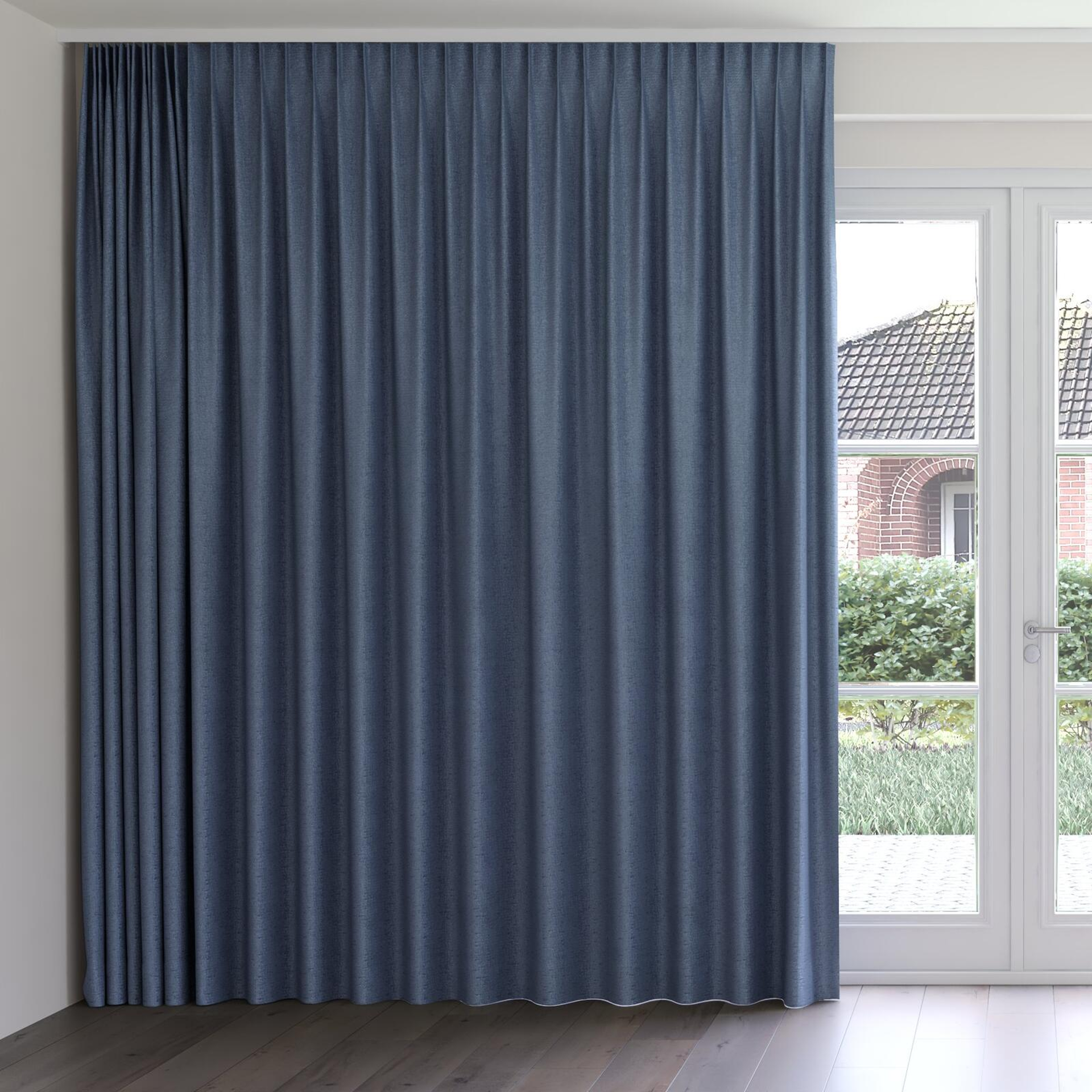 Front view of Monsieur Denim, on curtain rail