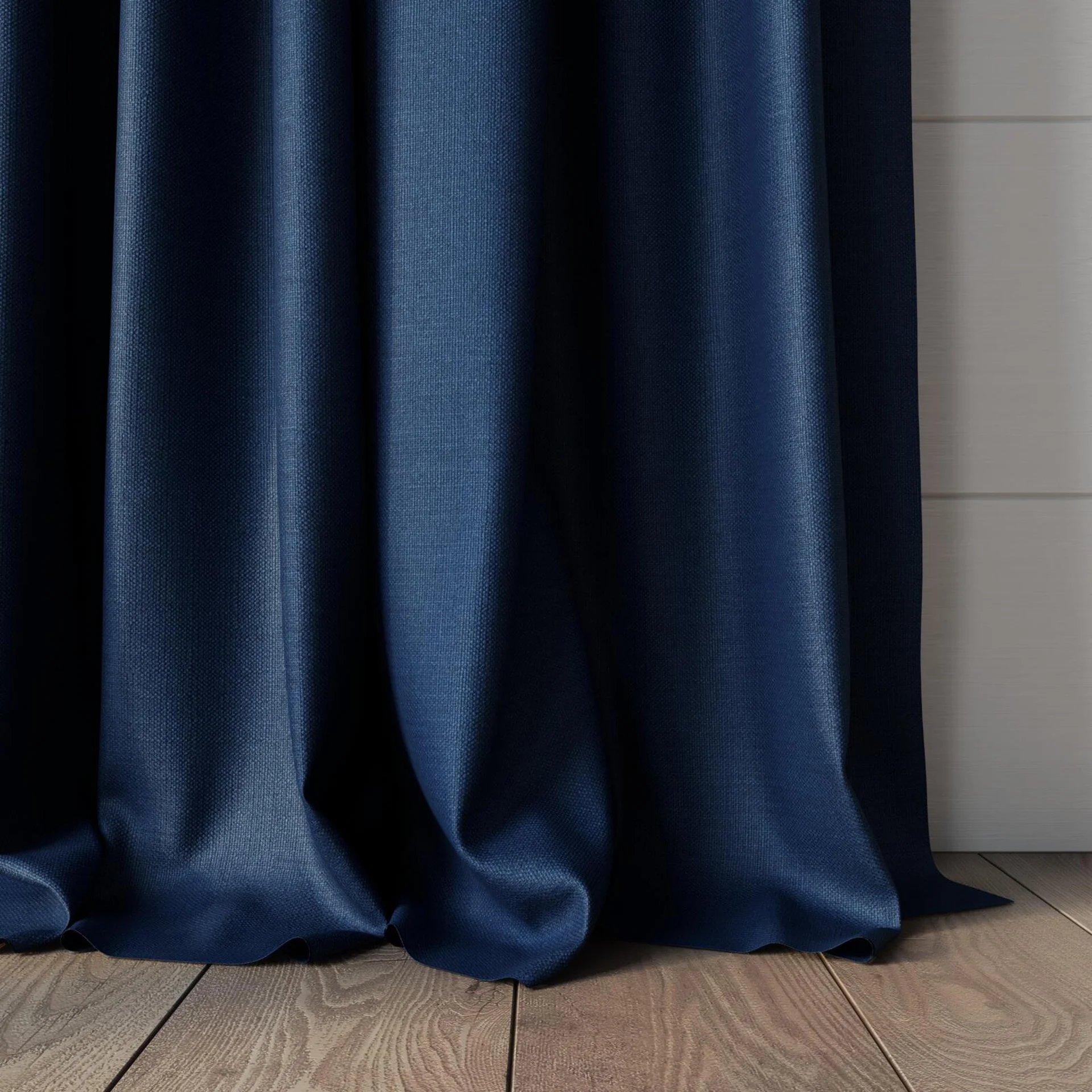 Bottom view of Linex Indigo, puddled, on curtain rod