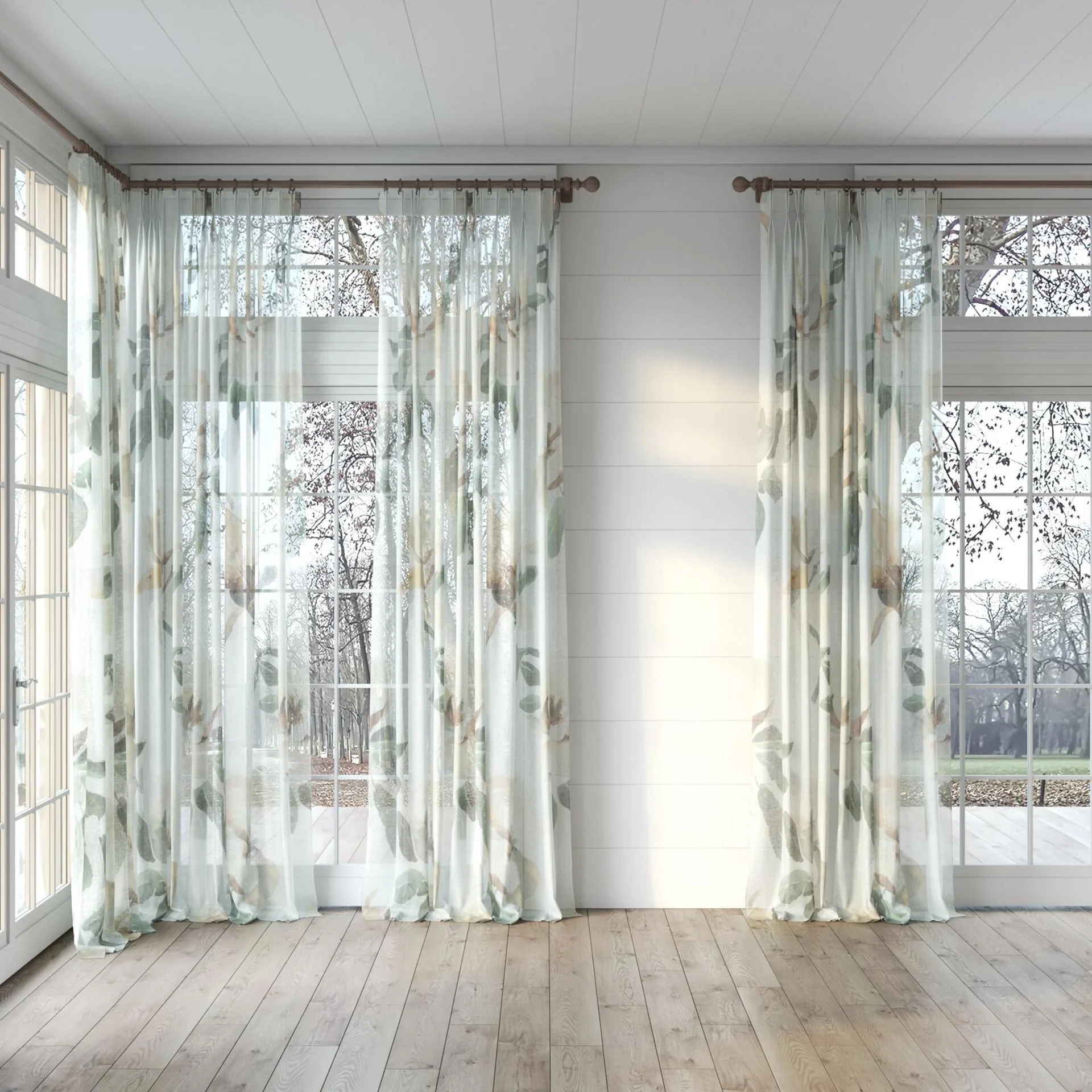 Full view of Magnolia Grande Sheer Cayenne, puddled, on curtain rod