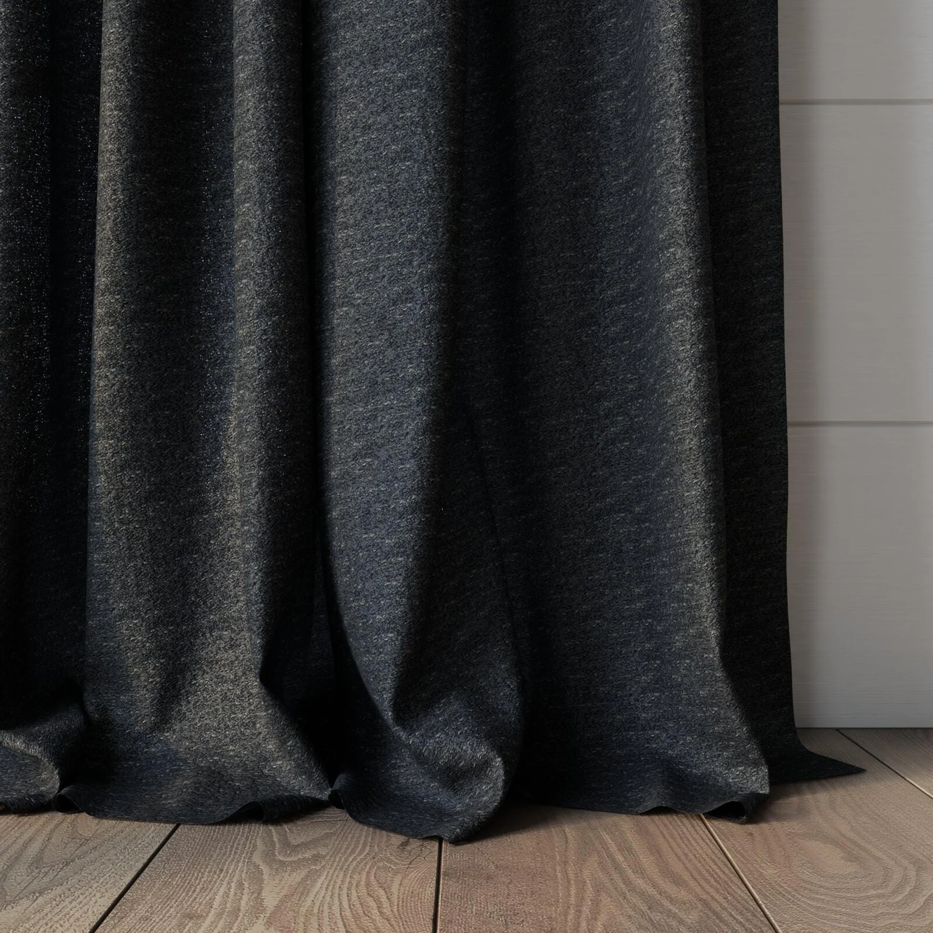 Bottom view of Metallique Obsidian, puddled, on curtain rod