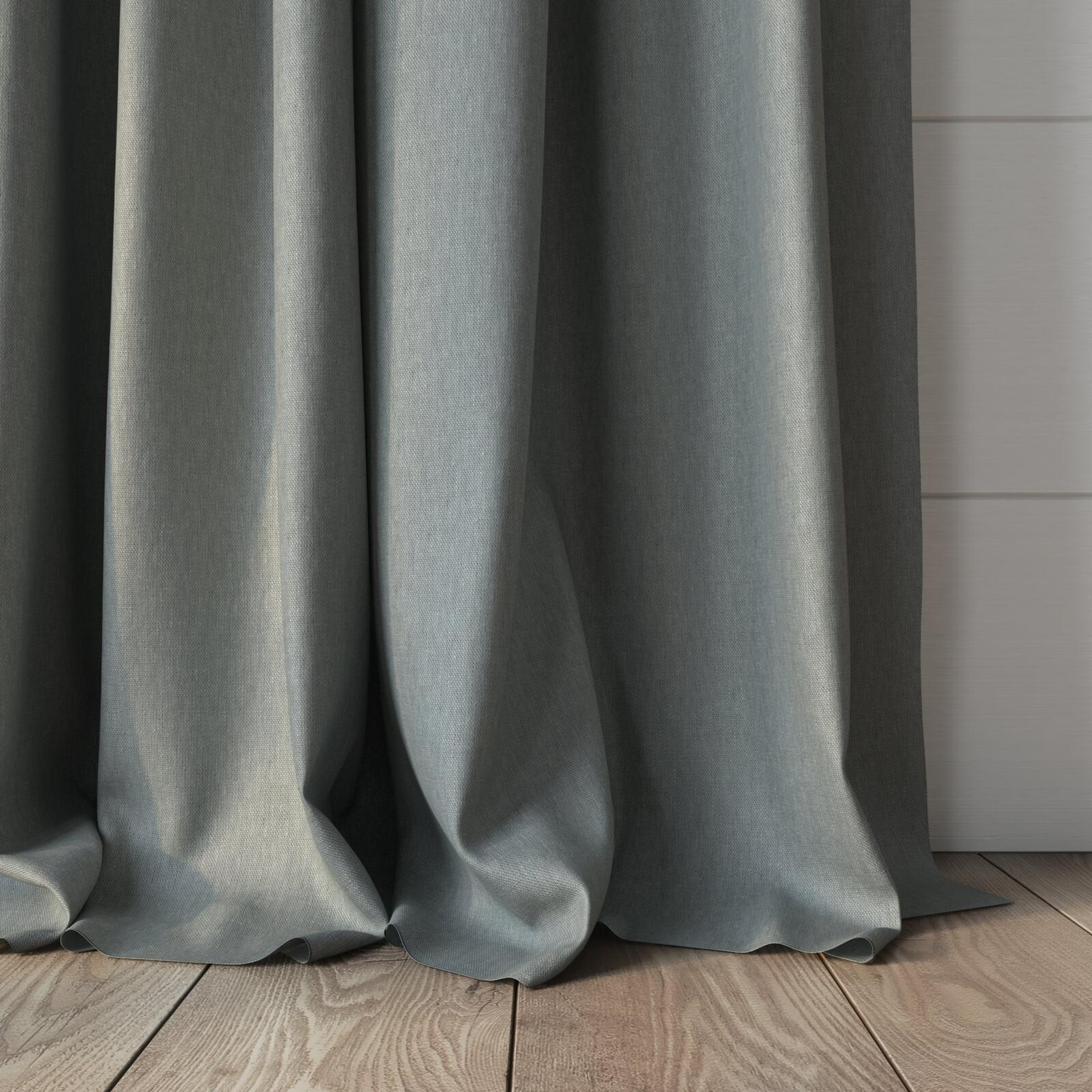 Bottom view of Infinite Seafoam, puddled, on curtain rod