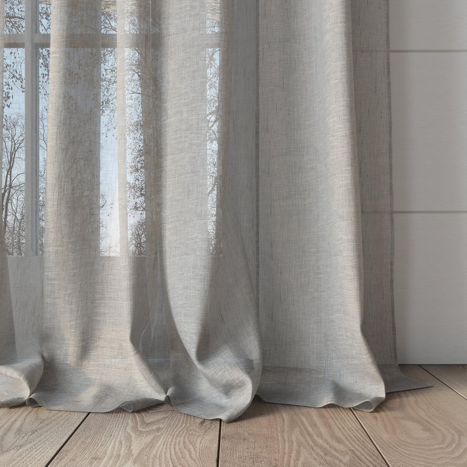 Bottom view of Lino Silver Birch, puddled, on curtain rod