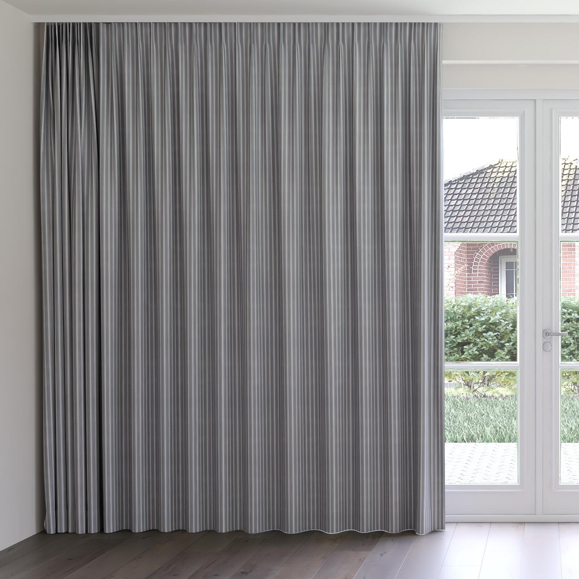 Front view of Cordial Mouse, on curtain rail