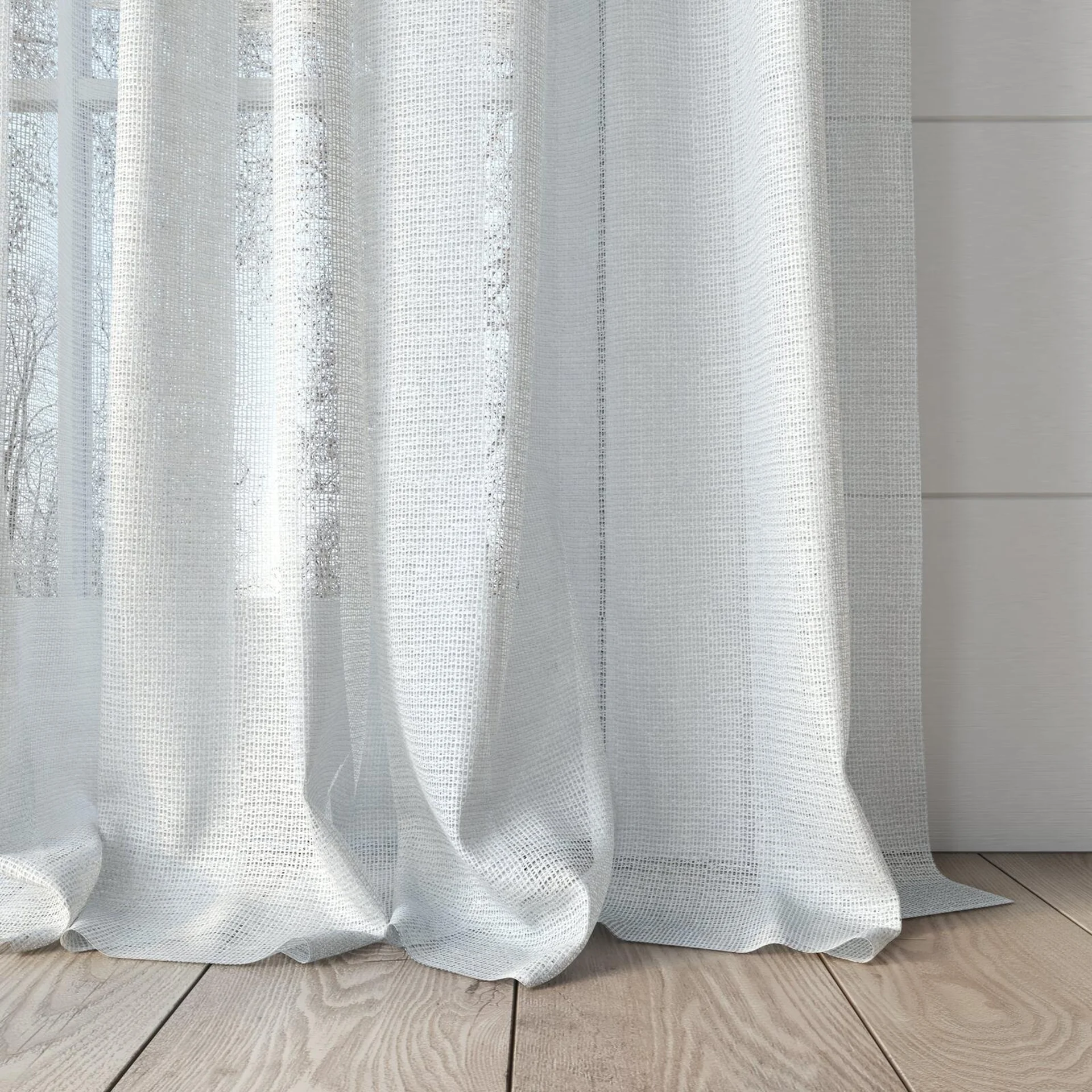 Bottom view of Mathilde Snow, puddled, on curtain rod