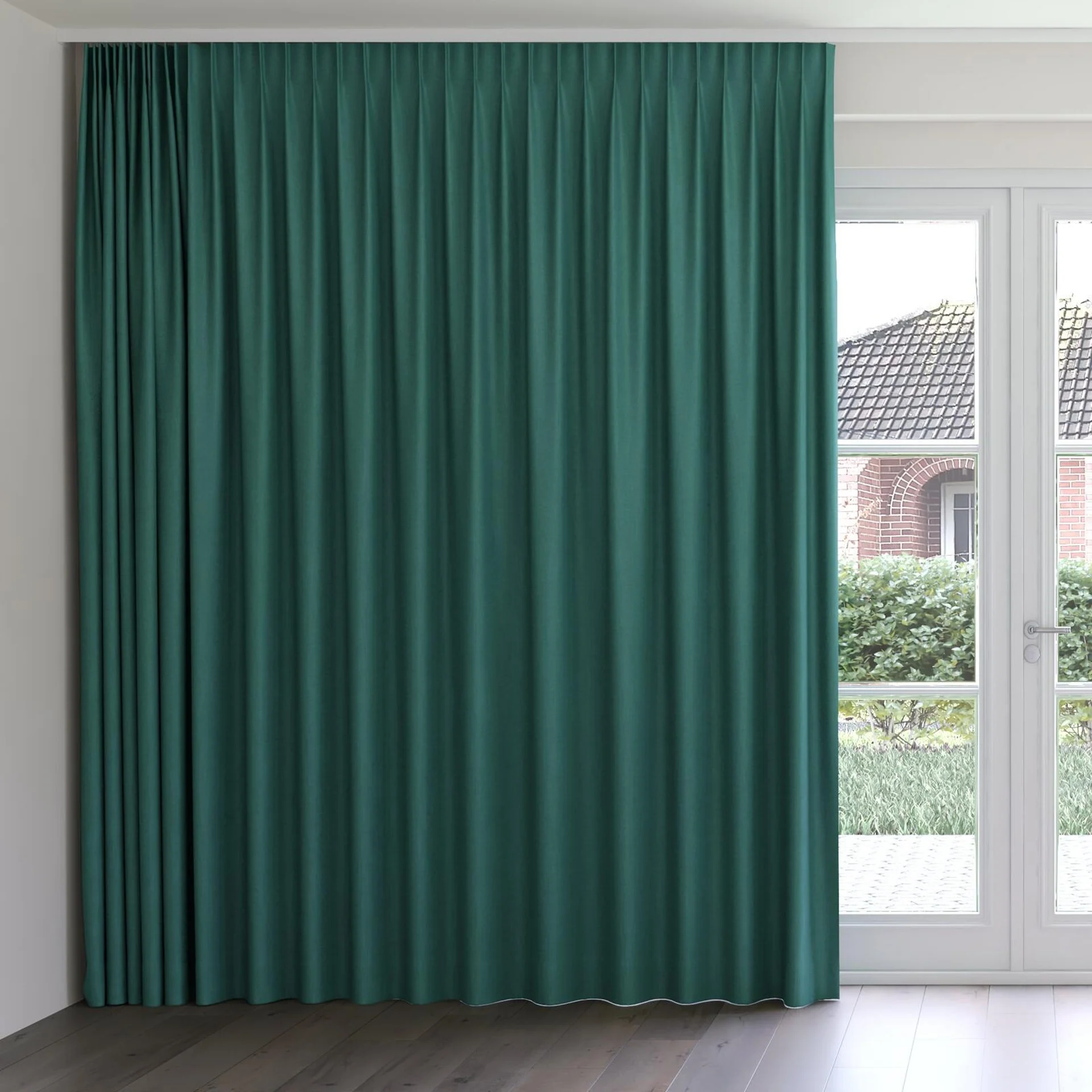 Front view of Cushy Emerald, on curtain rail