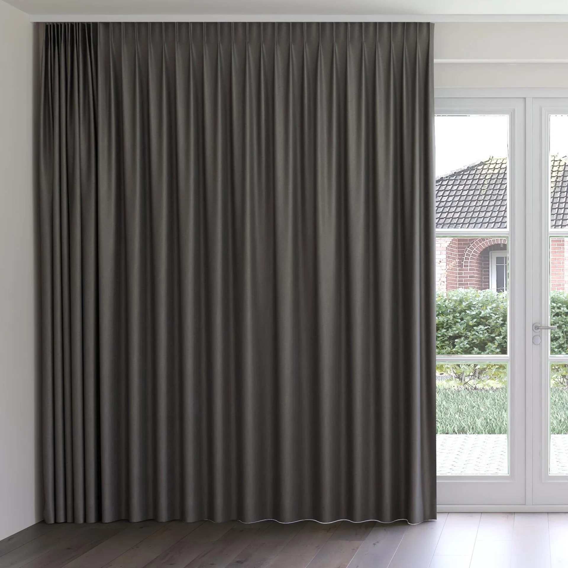 Front view of Eclipse Blackout Charcoal, on curtain rail