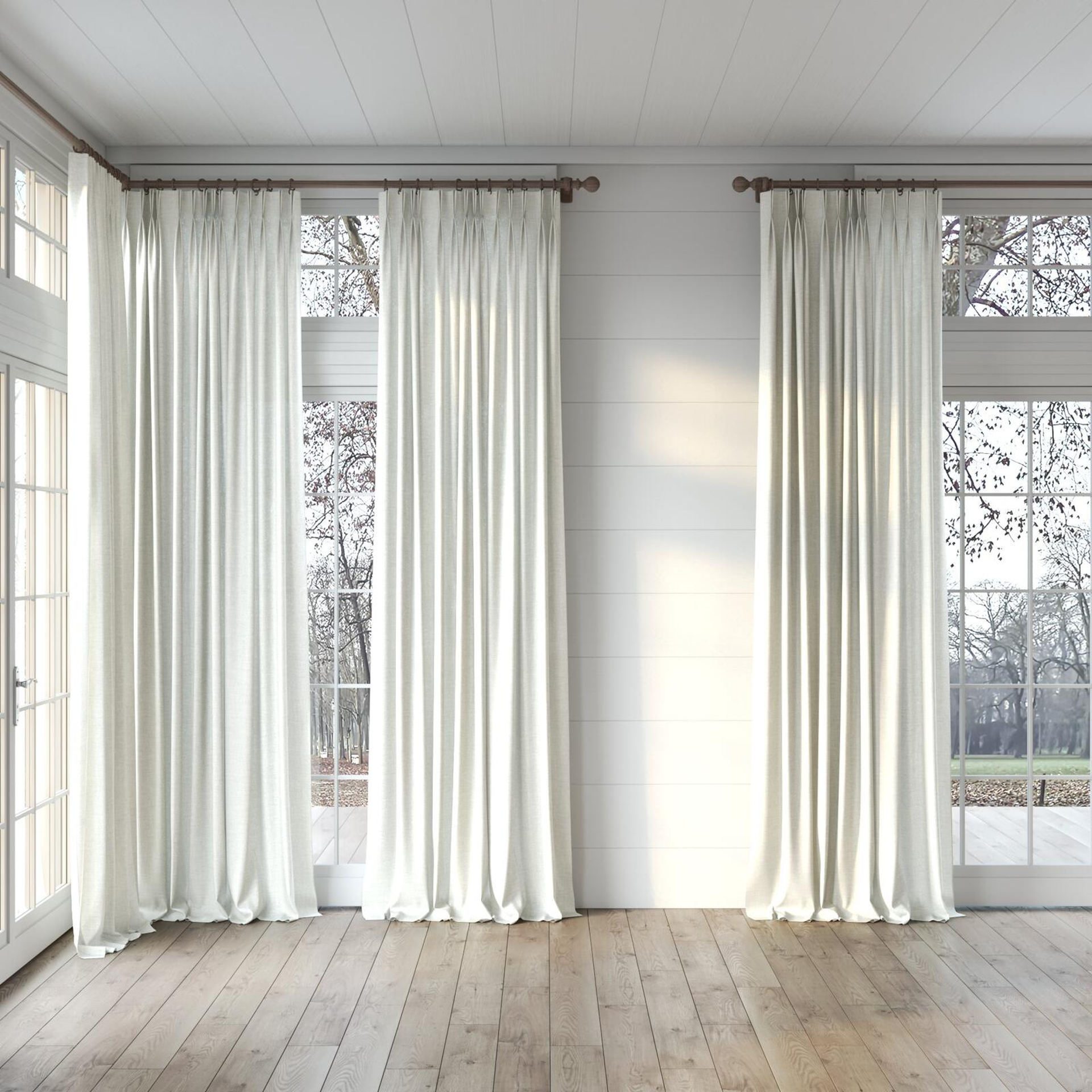 Full view of Motion Wool, puddled, on curtain rod