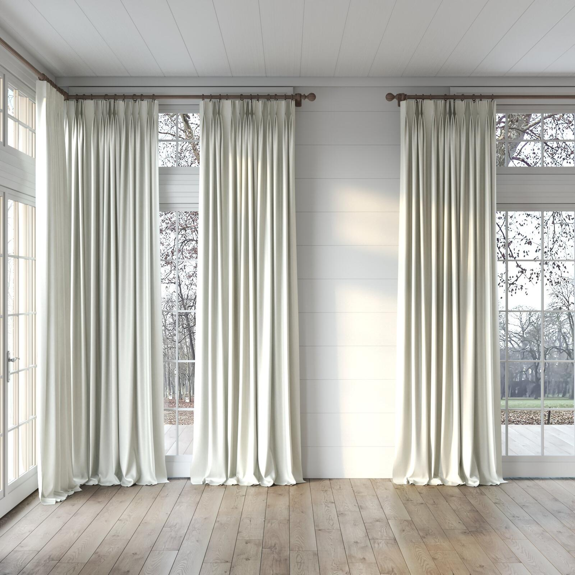 Full view of Matrix Ivory, puddled, on curtain rod