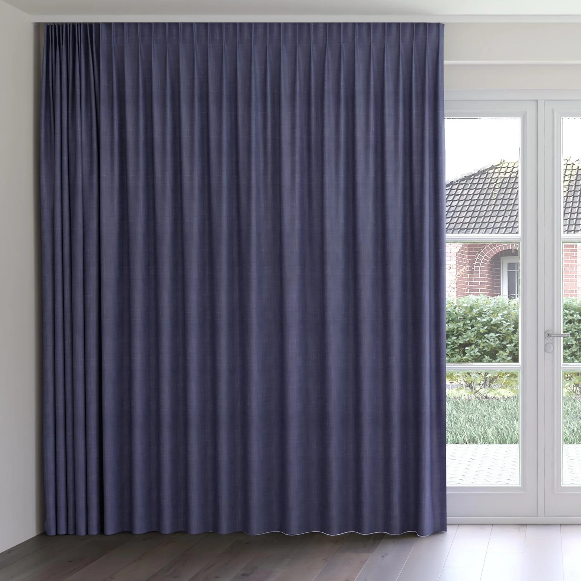 Front view of Loci Dim Out Denim, on curtain rail