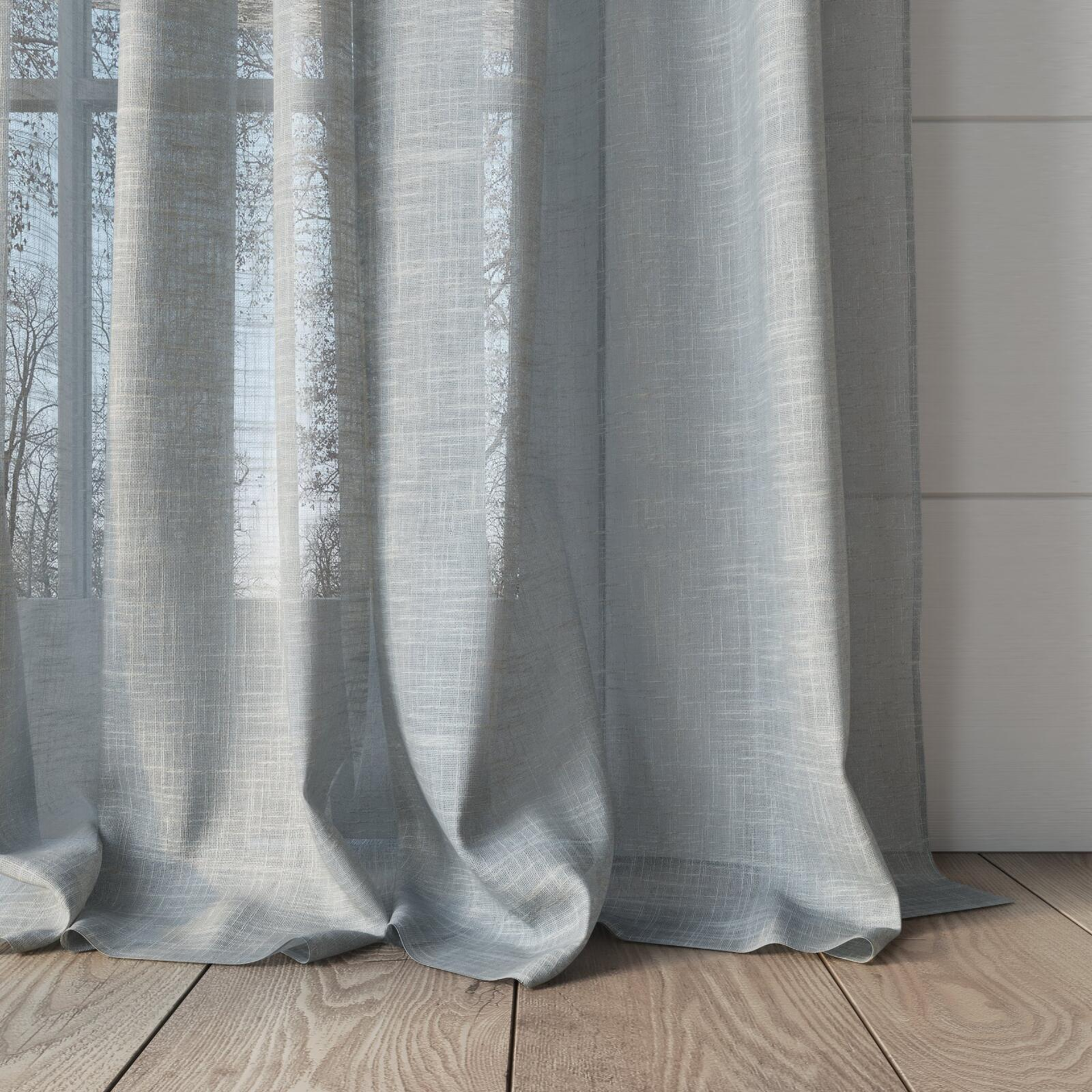 Bottom view of Savina Cloud, puddled, on curtain rod