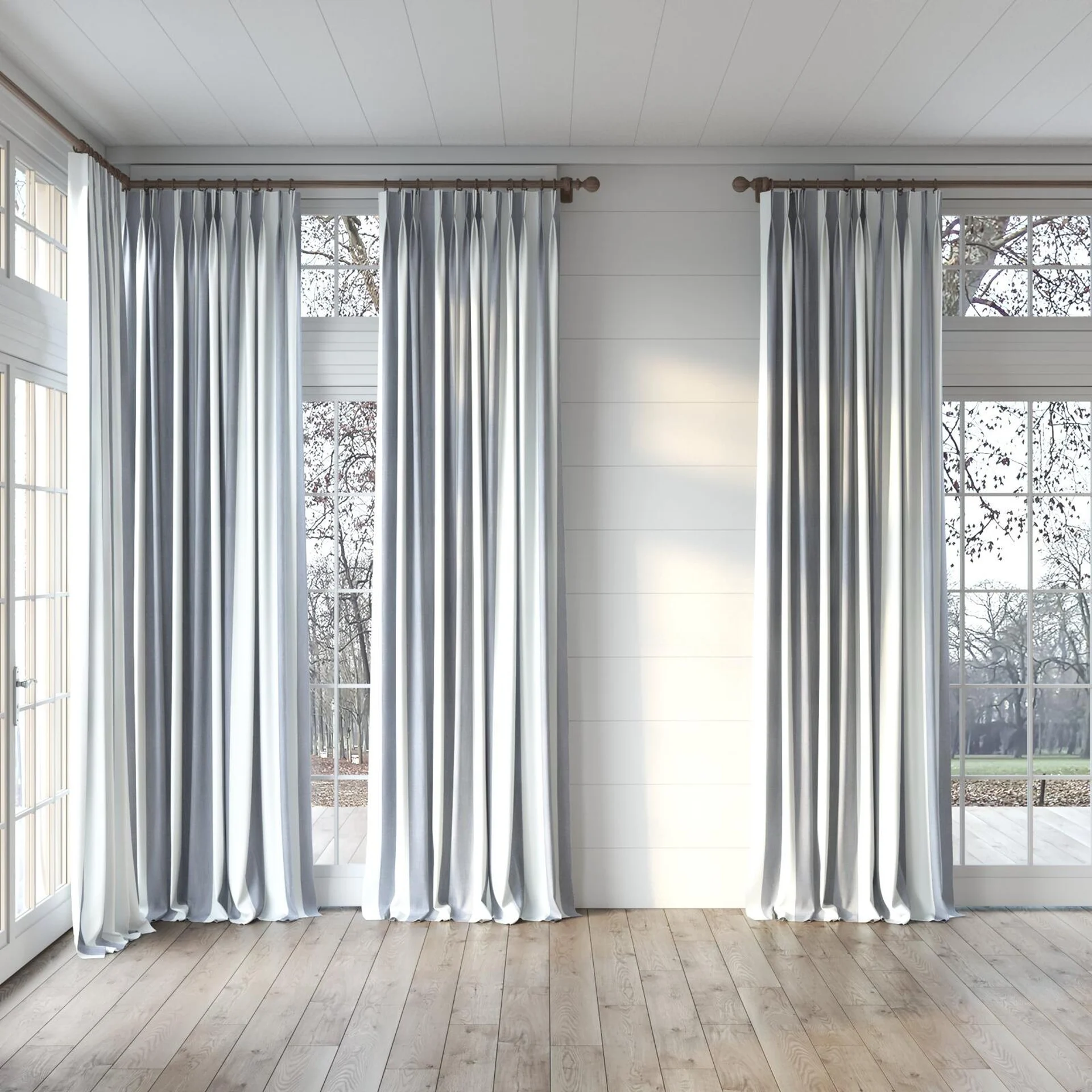 Full view of Chambray Bold Denim, puddled, on curtain rod