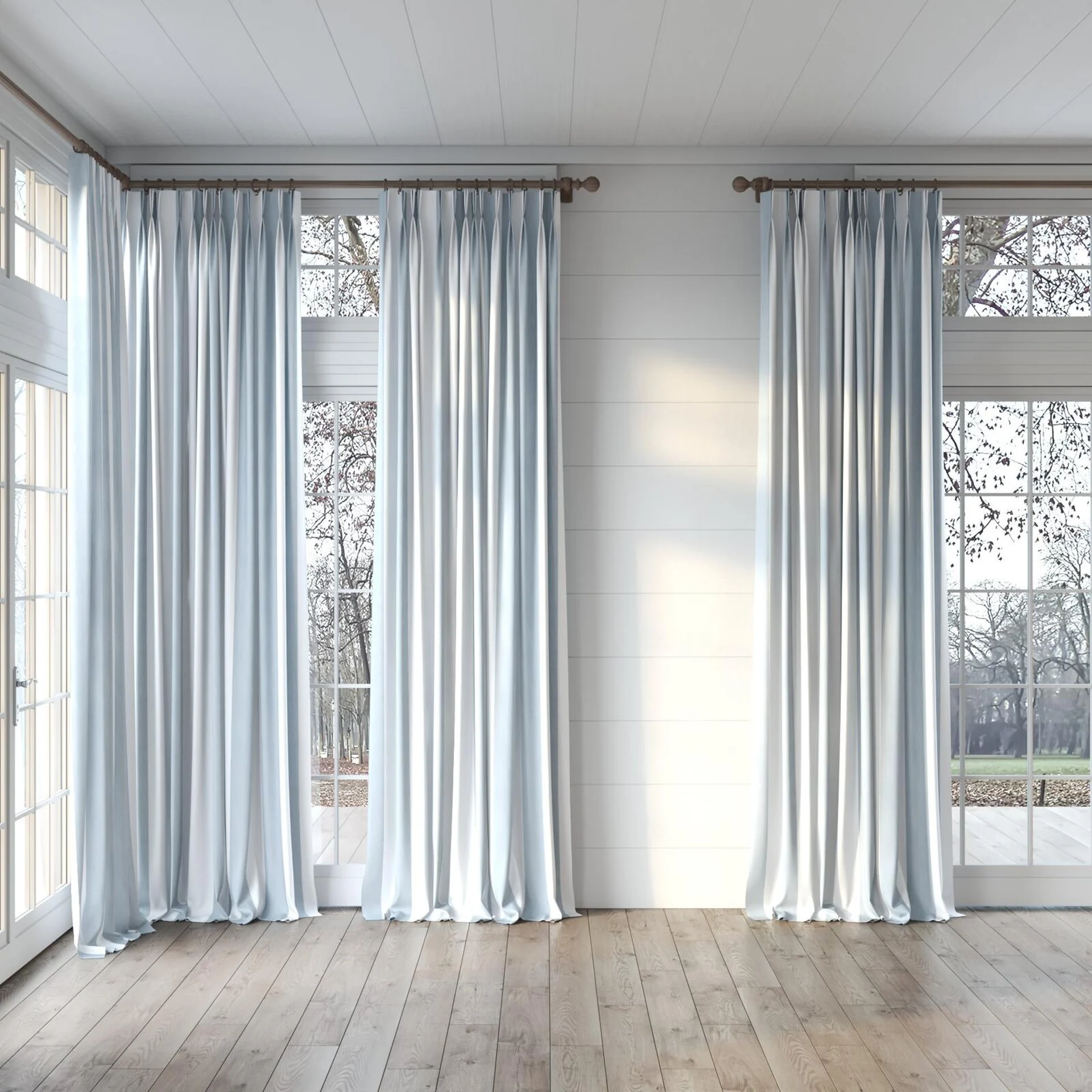 Full view of Chambray Bold Sky Blue, puddled, on curtain rod