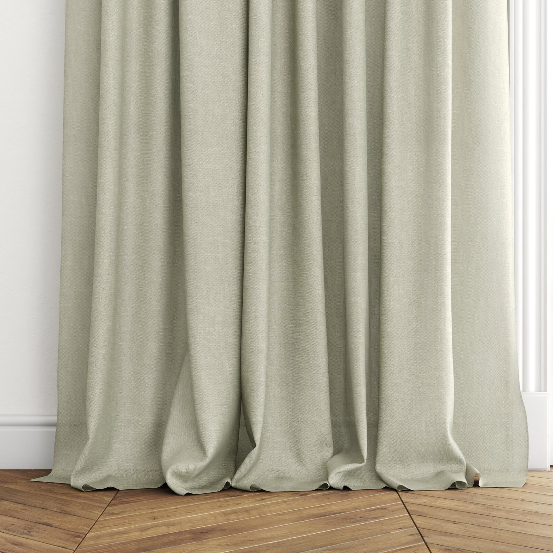 Bottom view of Lucidity Spearmint, puddled with pinch pleat, on curtain rod