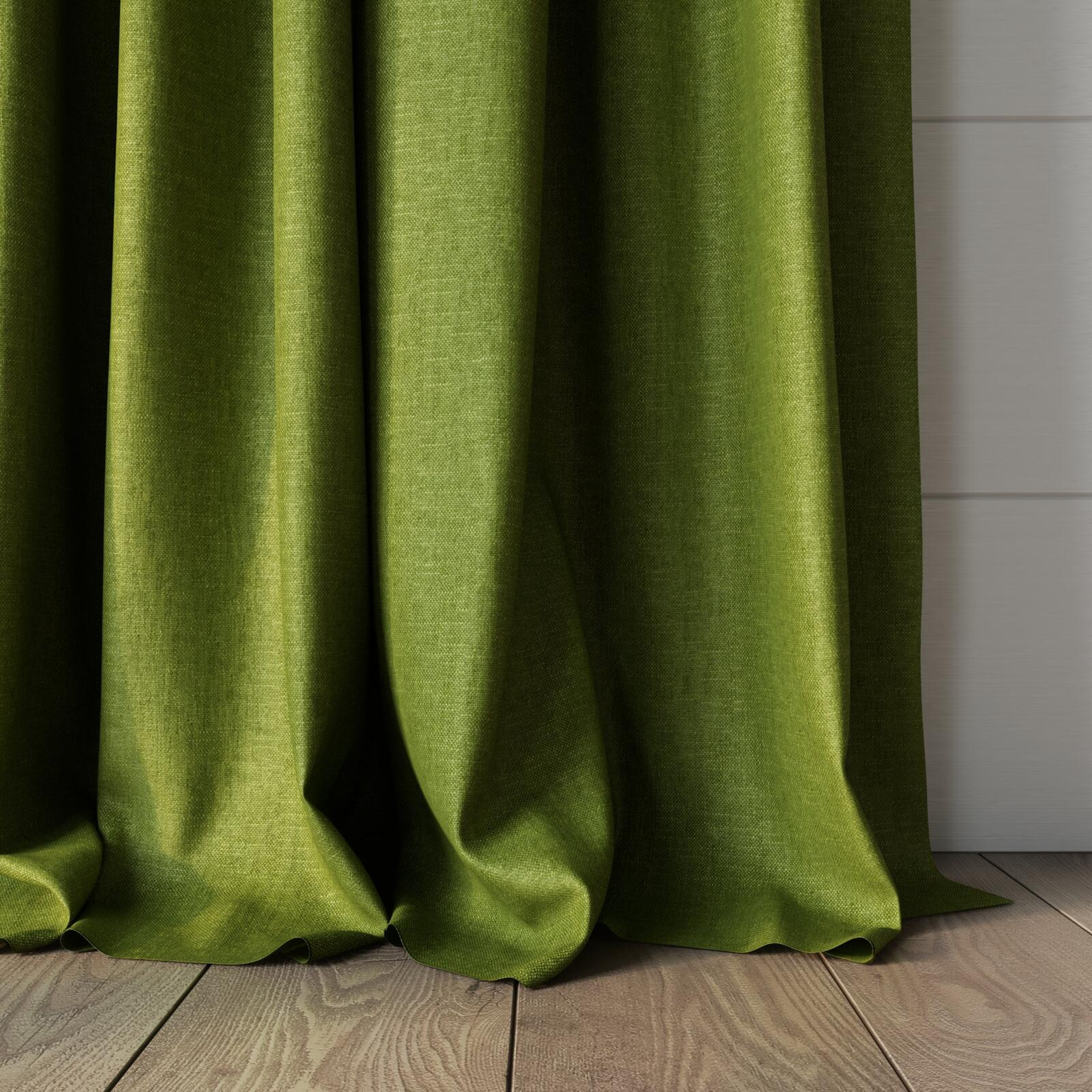 Bottom view of Rover Pesto, puddled, on curtain rod