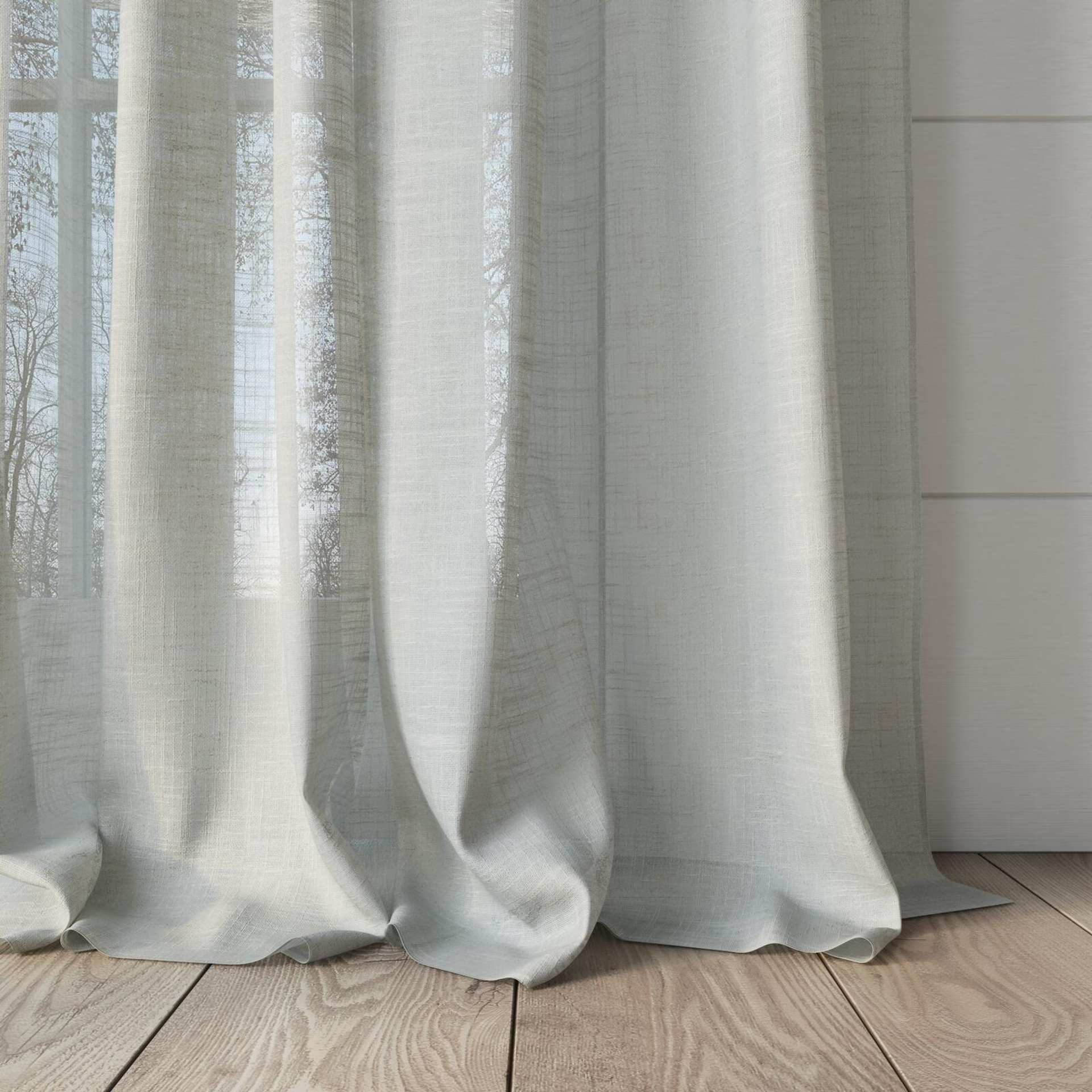 Bottom view of Savina Haze, puddled, on curtain rod