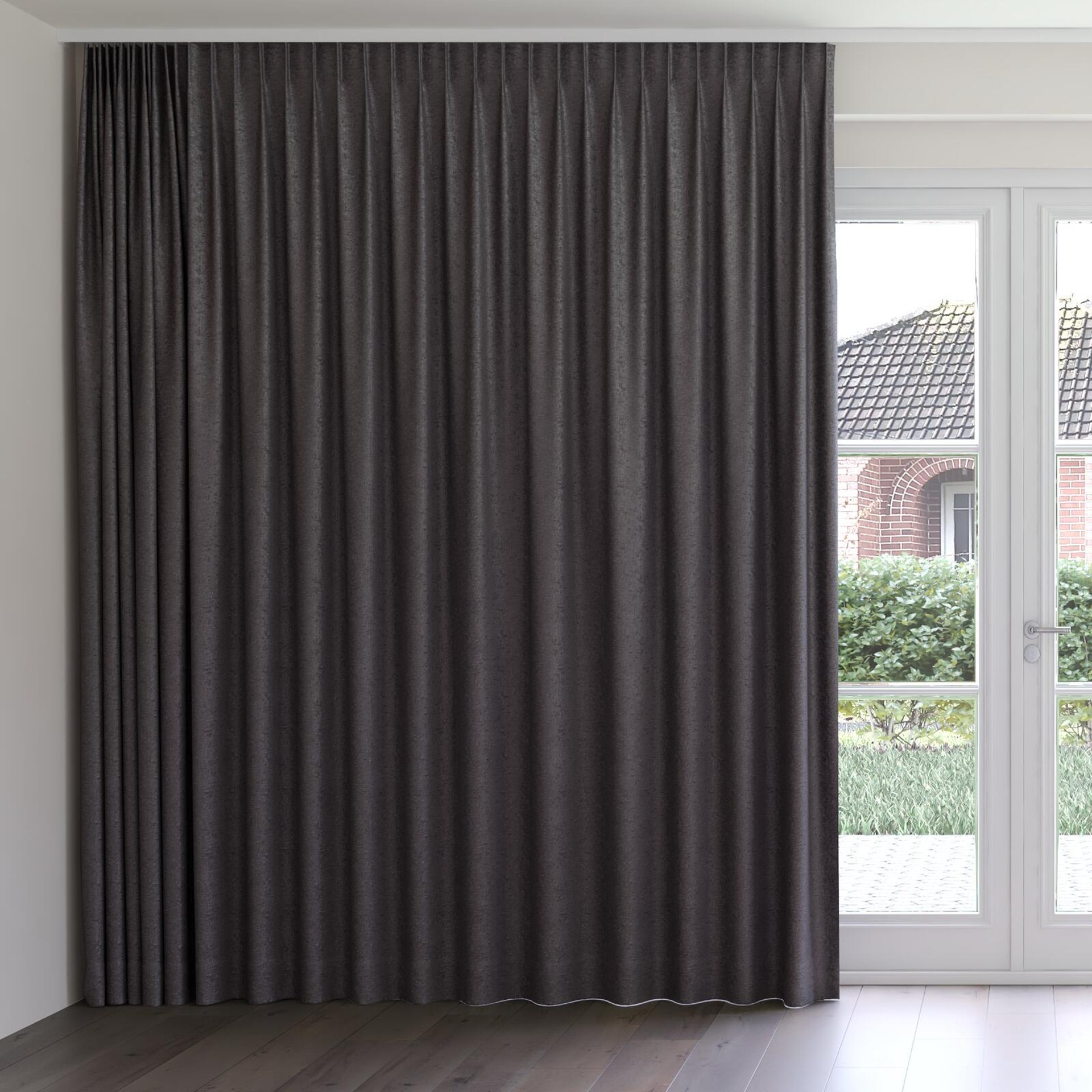 Front view of Monsieur Charcoal, on curtain rail