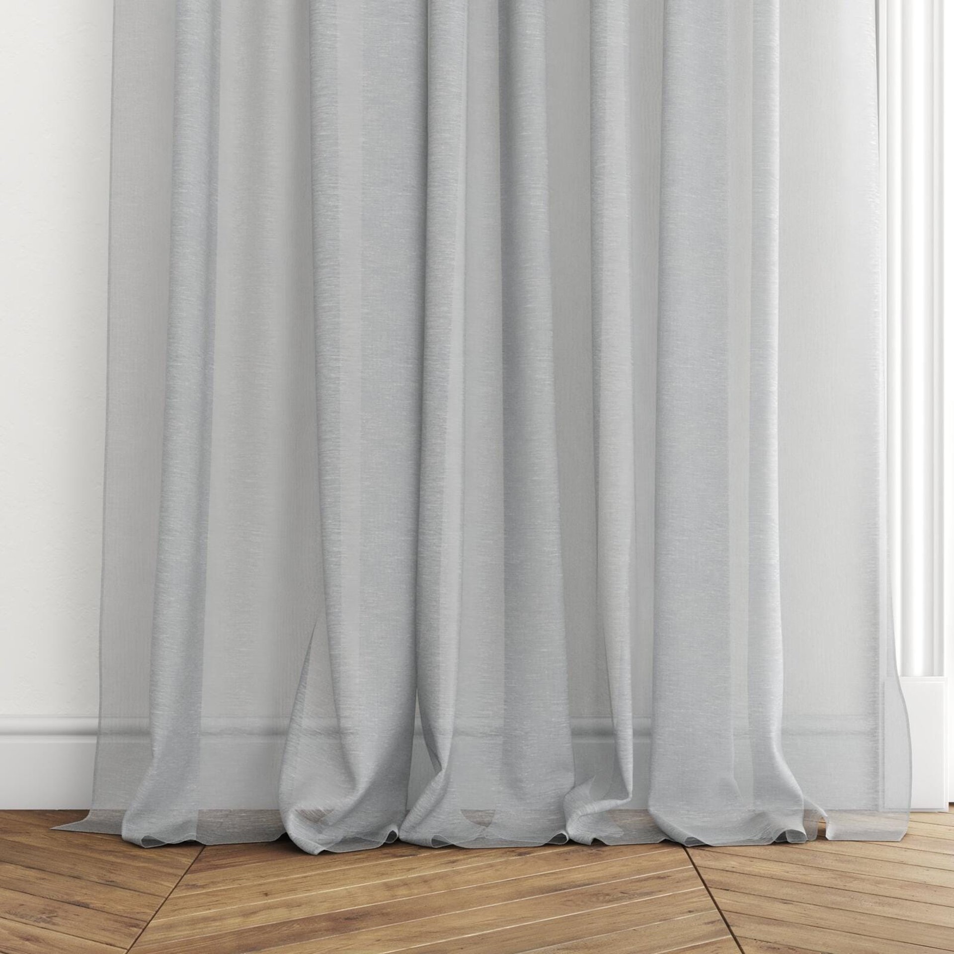 Bottom view of Locomotion Sky, puddled with pinch pleat, on curtain rod