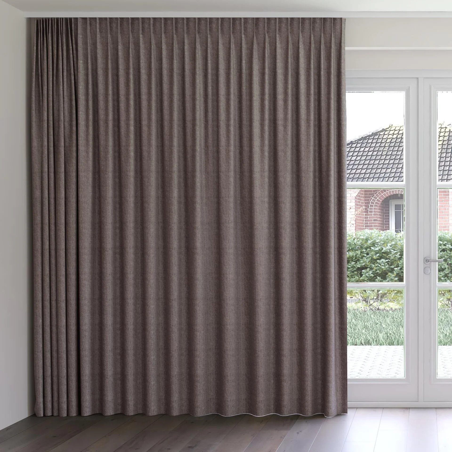 Front view of Monsieur Iron, on curtain rail