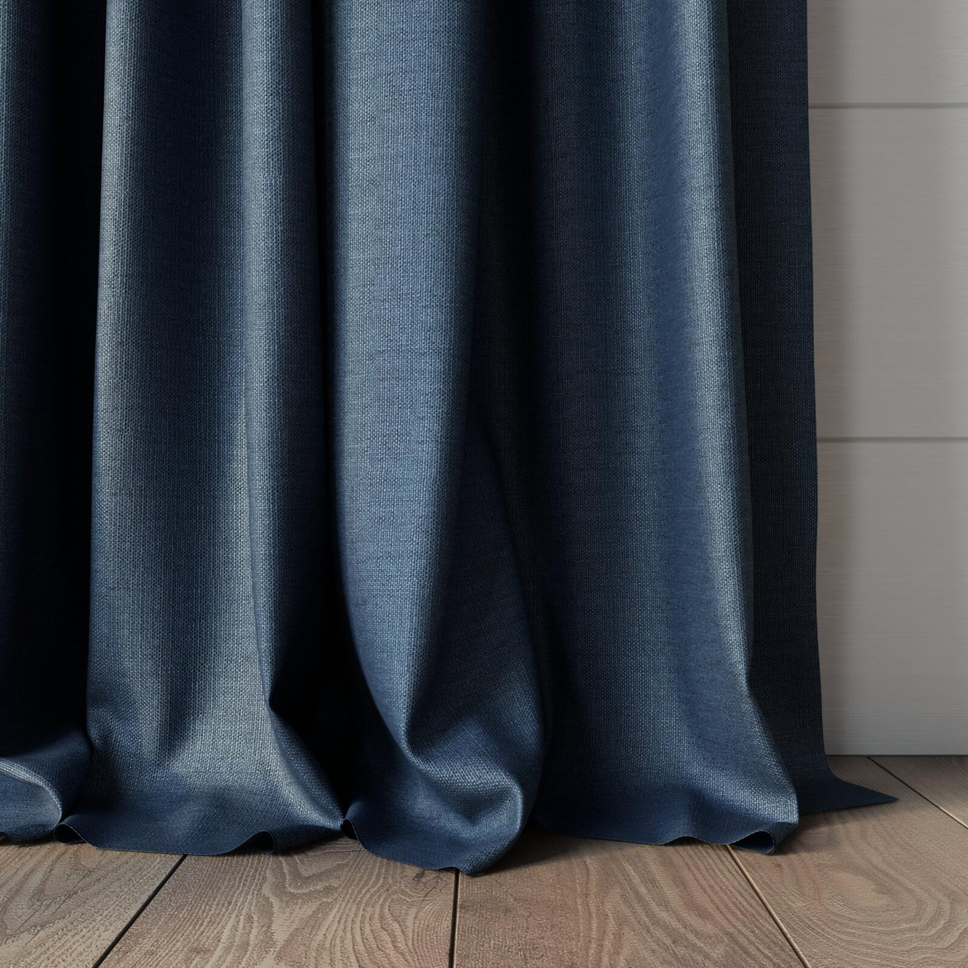 Bottom view of Linex Denim, puddled, on curtain rod