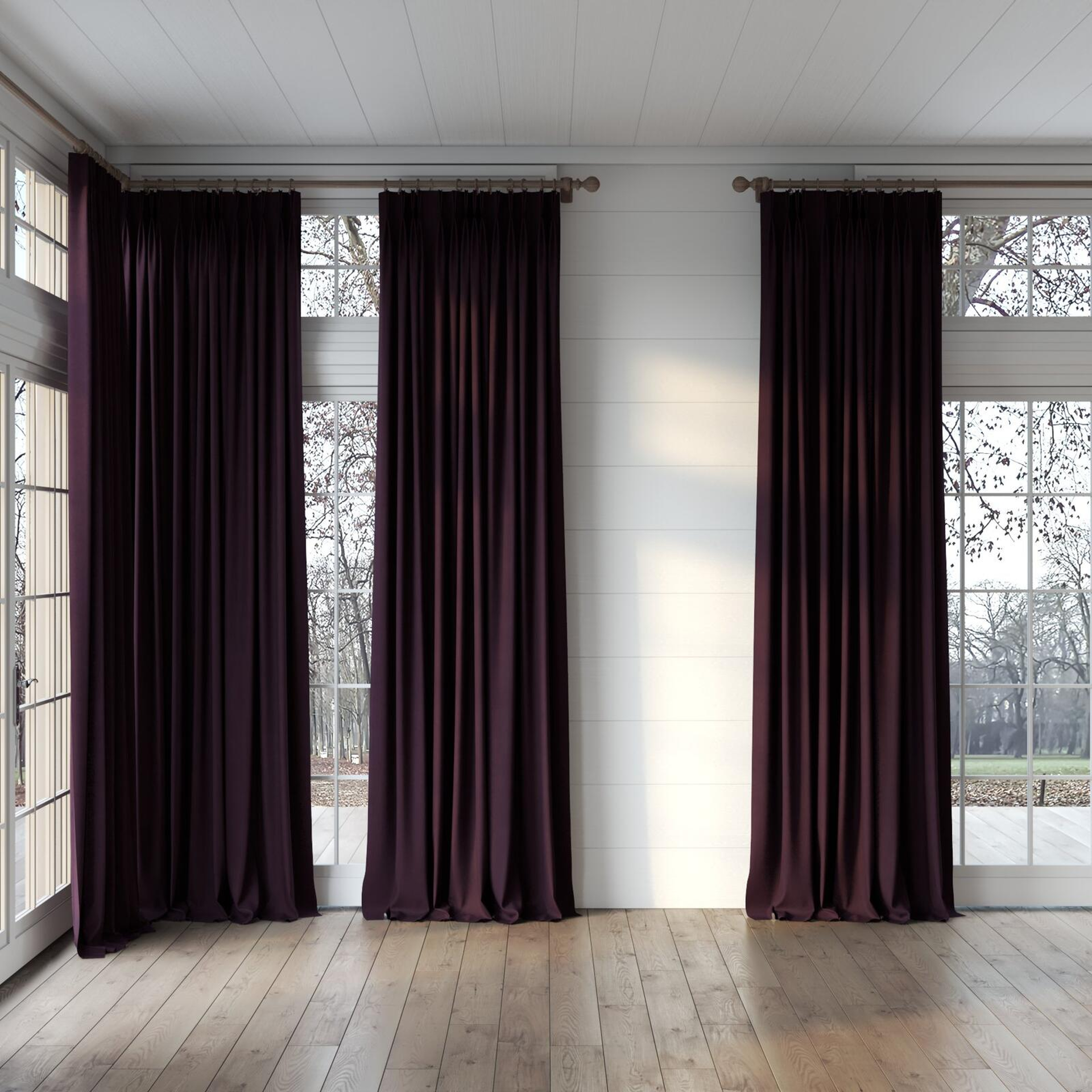 Full view of Lech Aubergine, puddled, on curtain rod