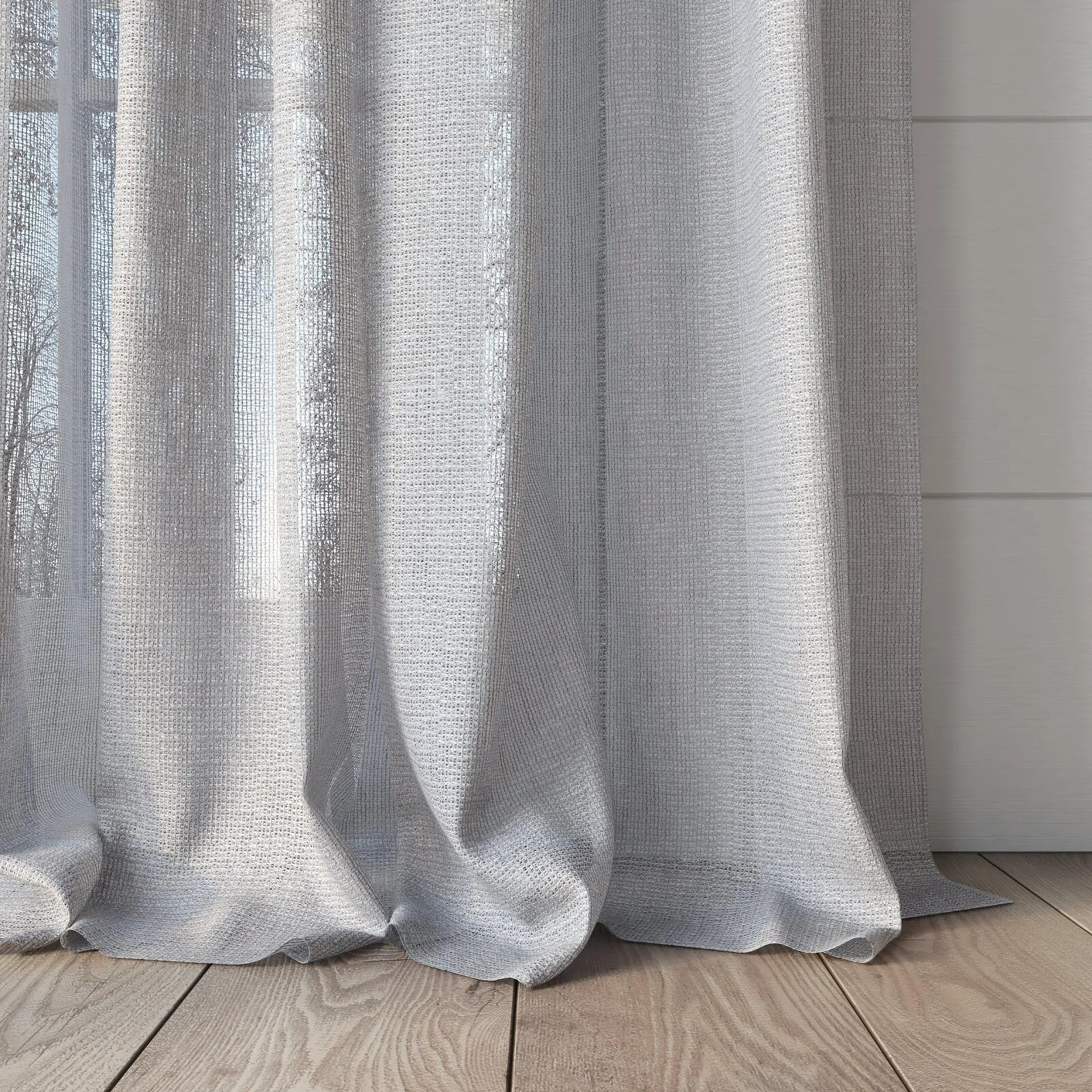 Bottom view of Mathilde Mist, puddled, on curtain rod