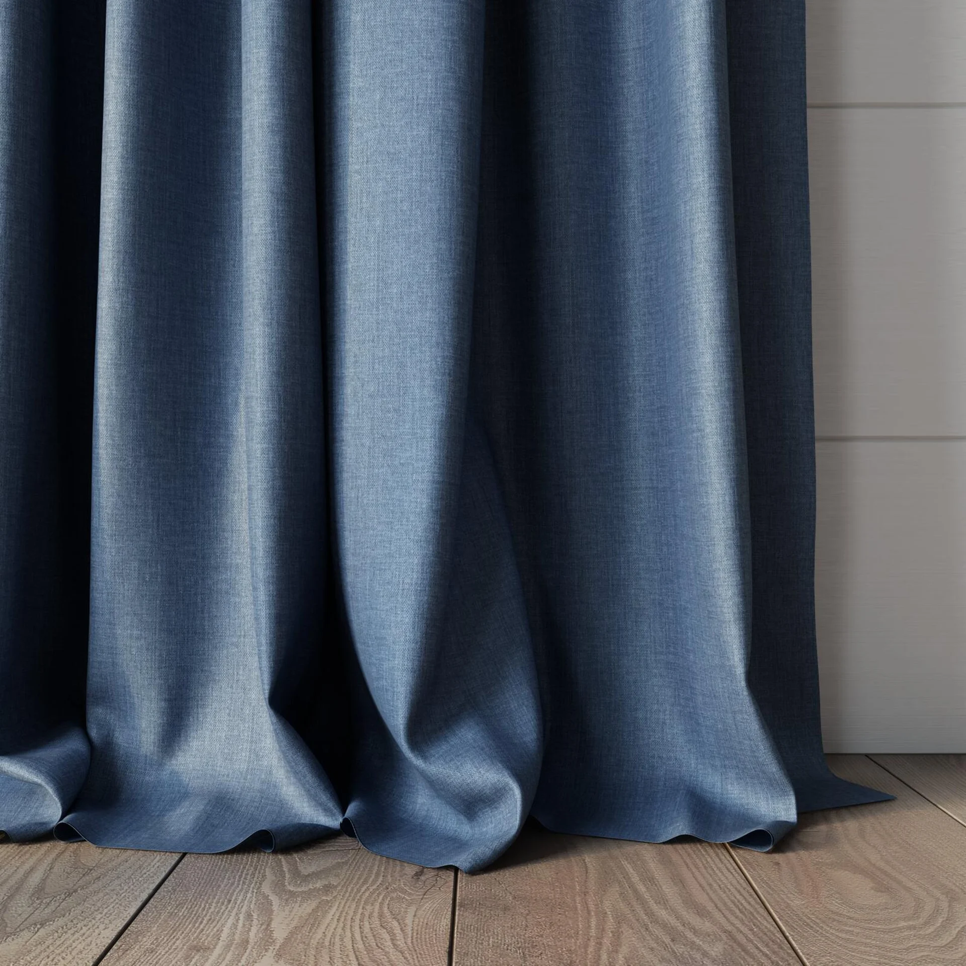 Bottom view of Kidglove Denim, puddled, on curtain rod