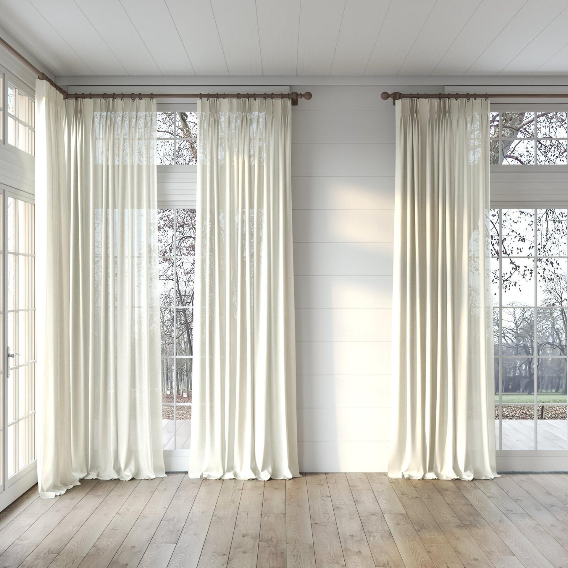 Full view of Arcadia Marzipan, puddled, on curtain rod