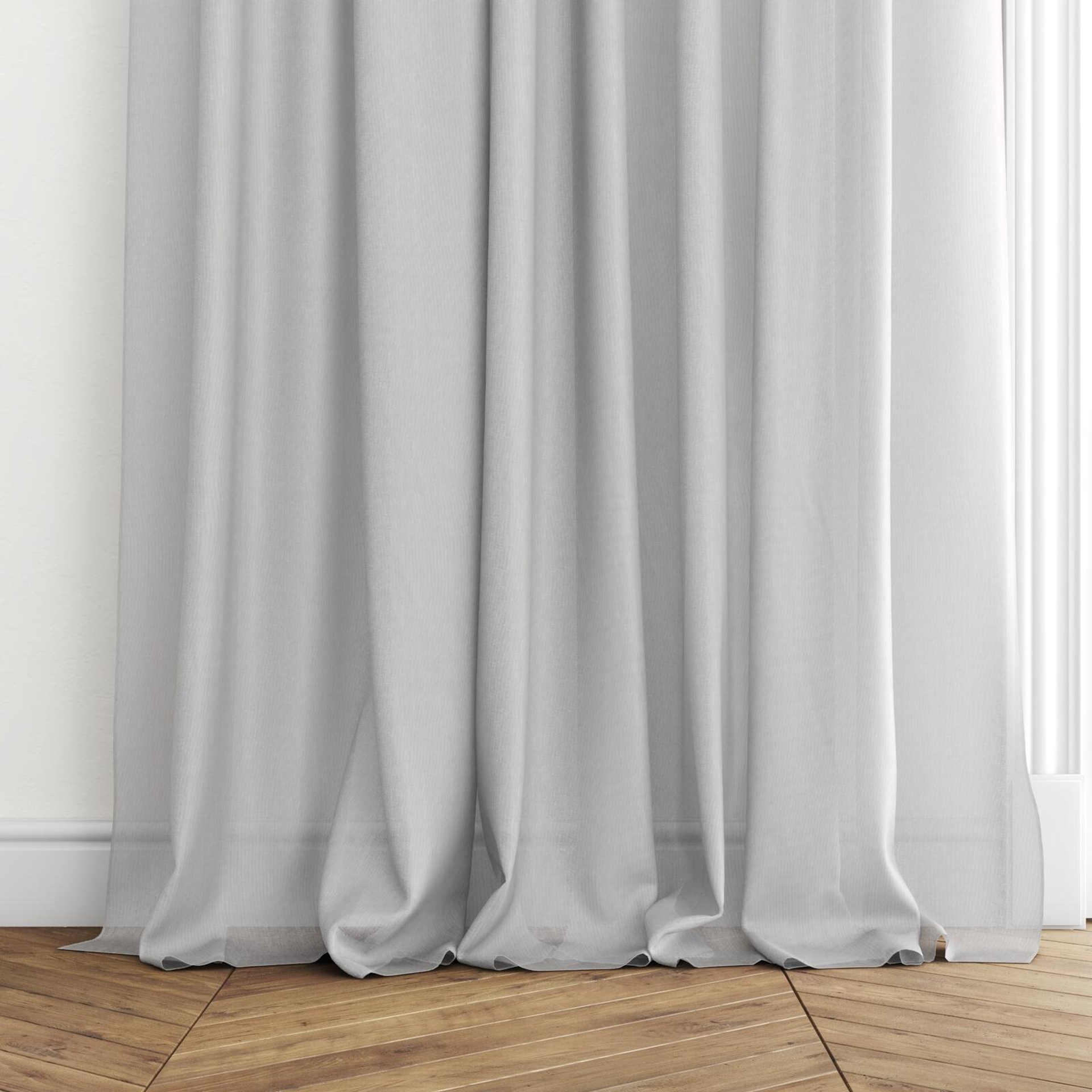 Bottom view of Jaba Ice, puddled with pinch pleat, on curtain rod