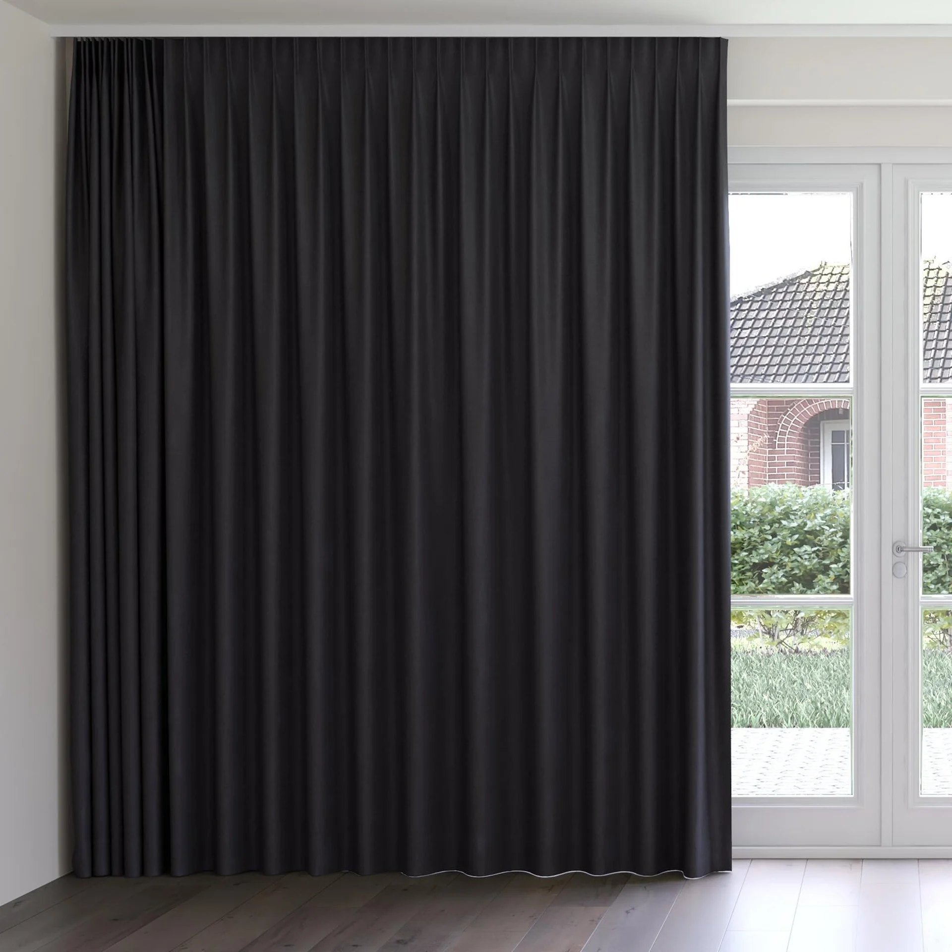 Front view of Cushy Raven, on curtain rail