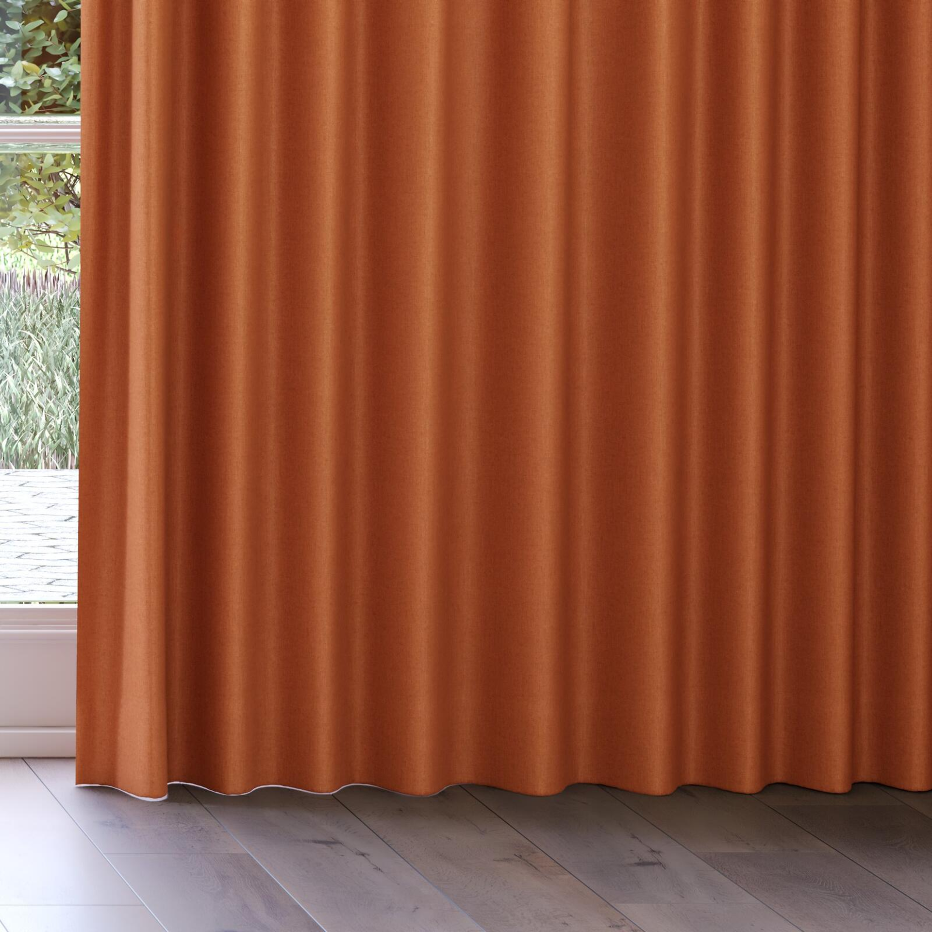 Bottom view of Cushy Ginger, on curtain rail