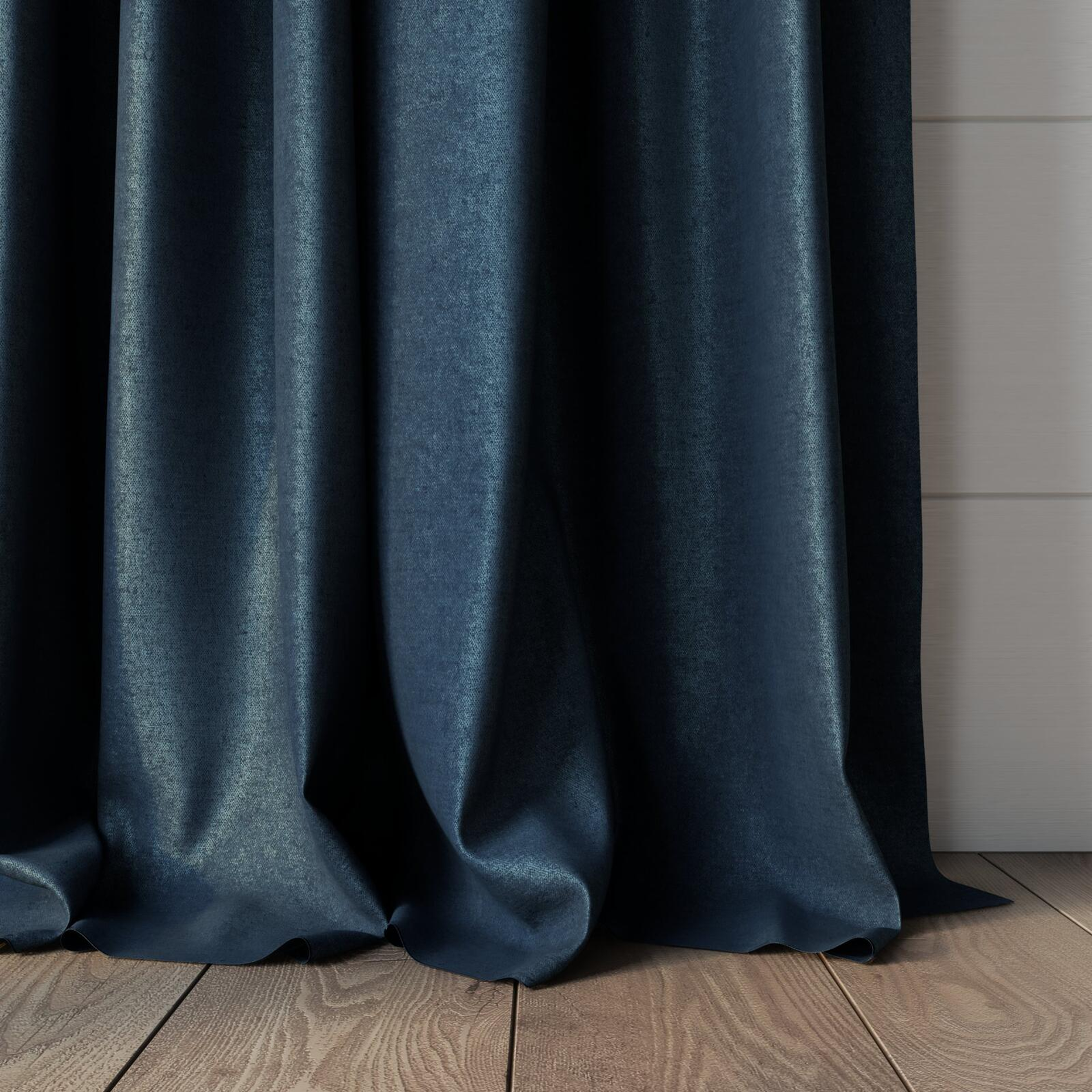 Bottom view of Drama Teal, puddled, on curtain rod