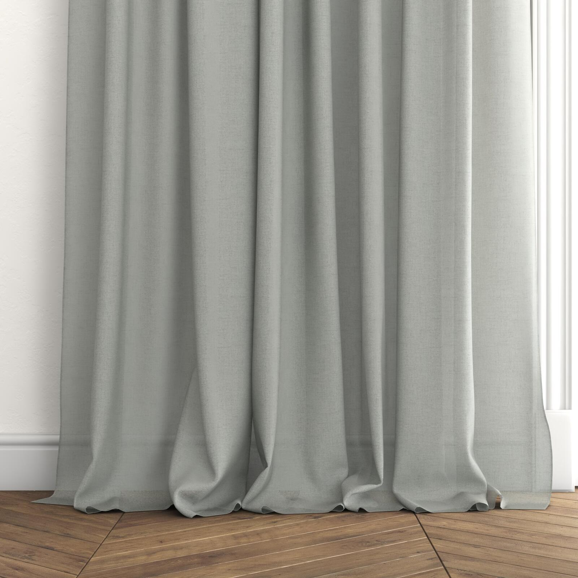 Bottom view of Rava Basil, puddled with pinch pleat, on curtain rod