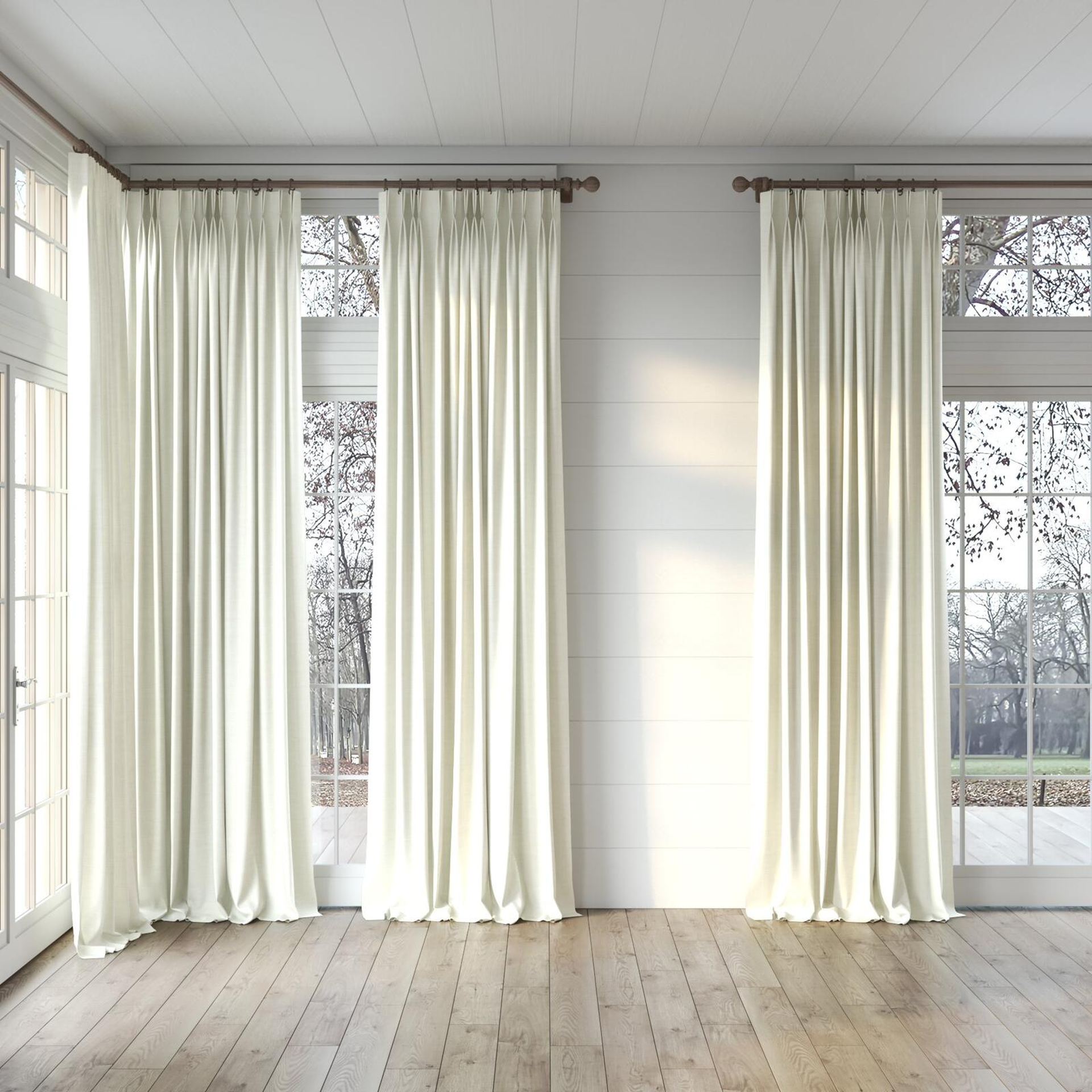 Full view of Keystone Ecru, puddled, on curtain rod