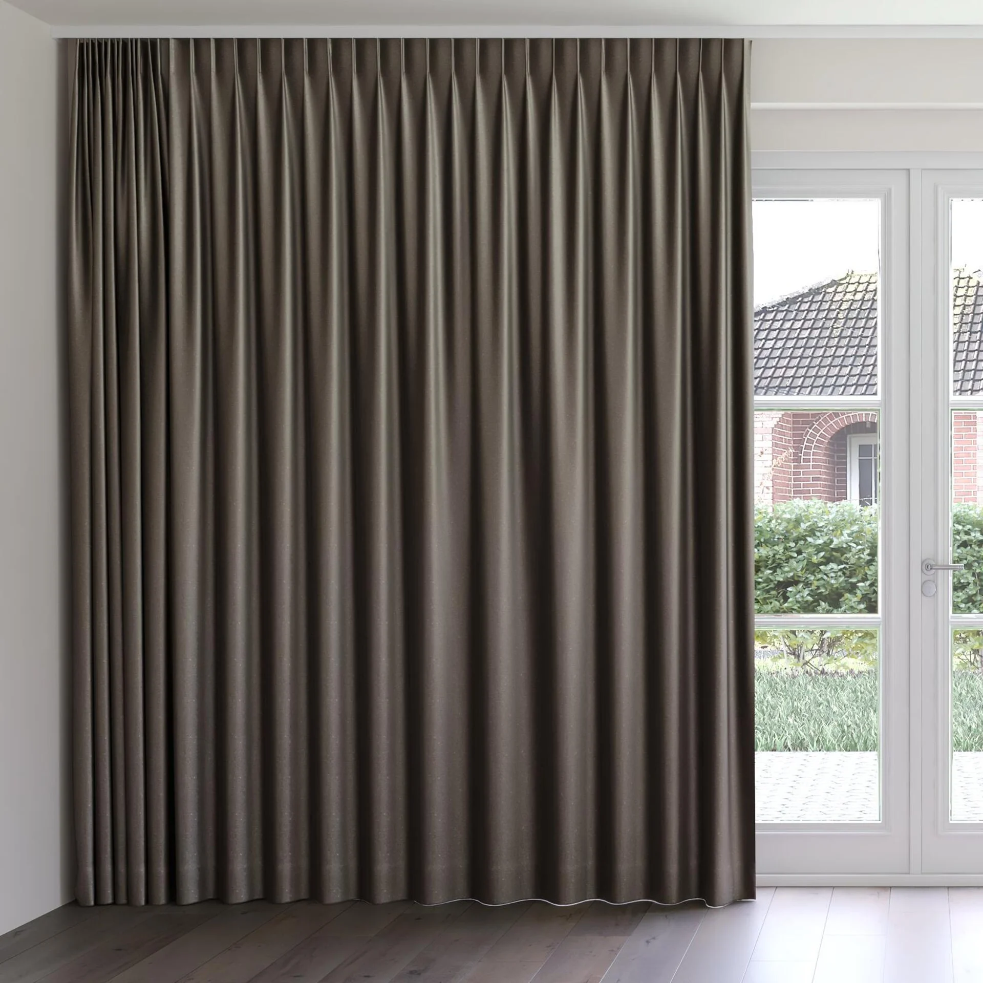 Front view of Recharge Brownie, on curtain rail